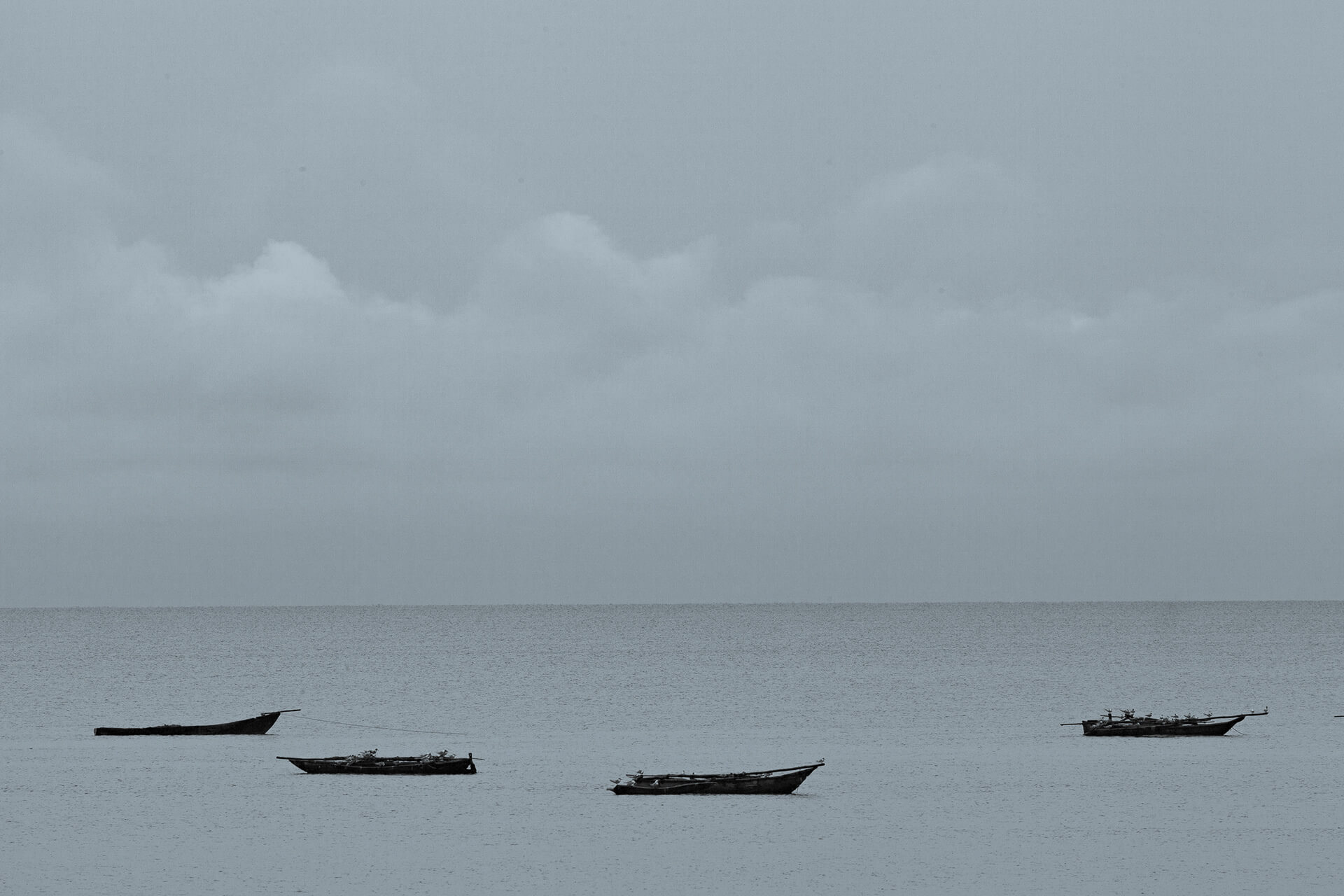 Fishing boats at dusk at Bagamoyo, Tanzania