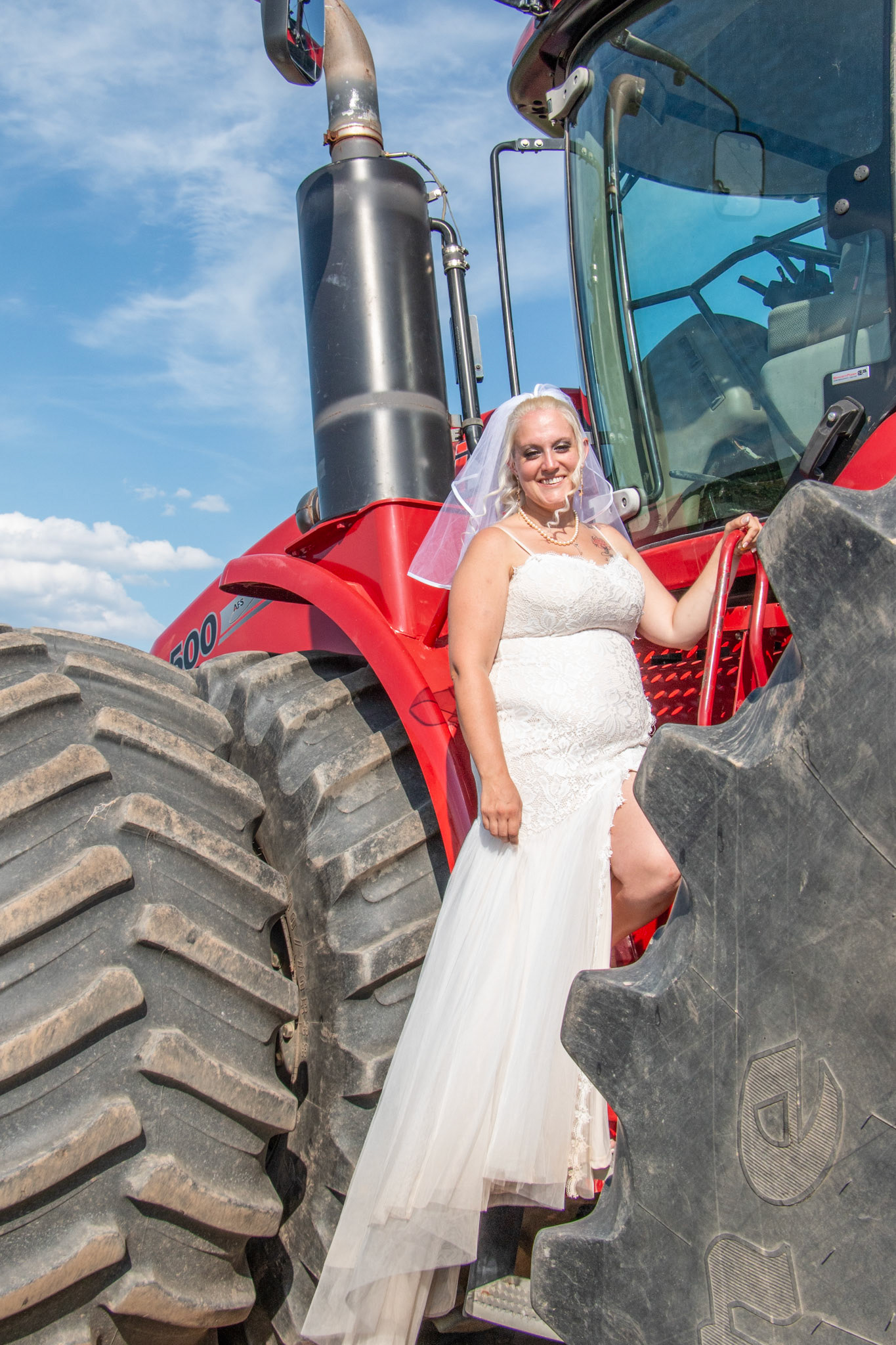 Wedding, Sunflowers of Sanborn, NY, bride and tractor.