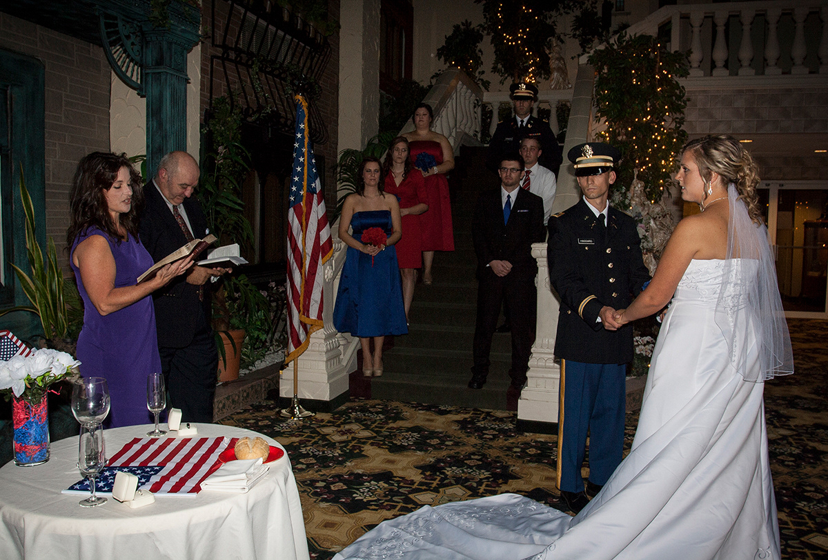 Wedding ceremony in Williamsville, NY, serviceman and bride