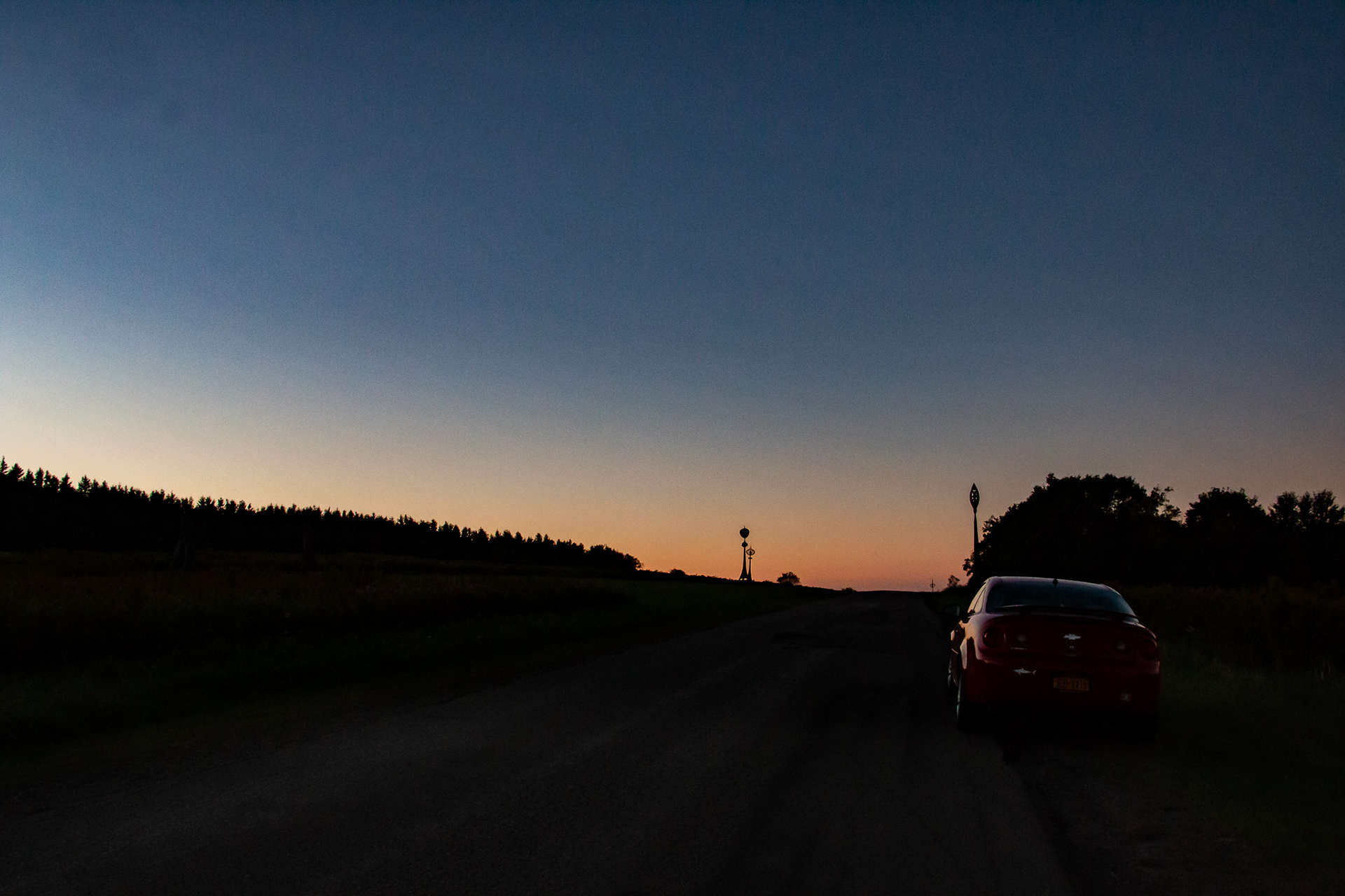 My Cobalt at sunset at Griffis Sculpture Park, East Otto NY.