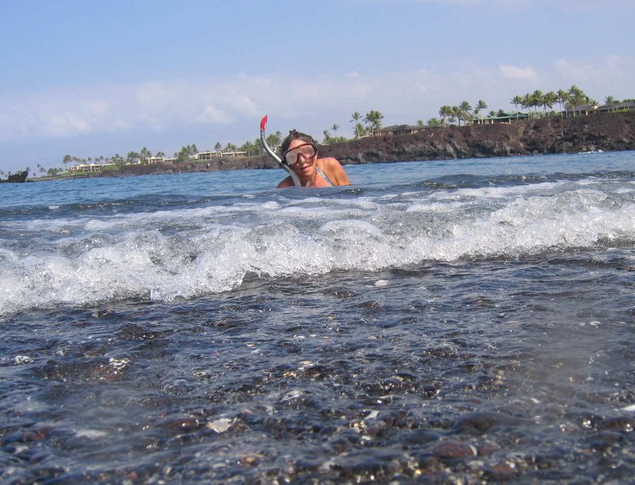 Snorkeling at Waikoloa Resorts Black Sand beach, HI.