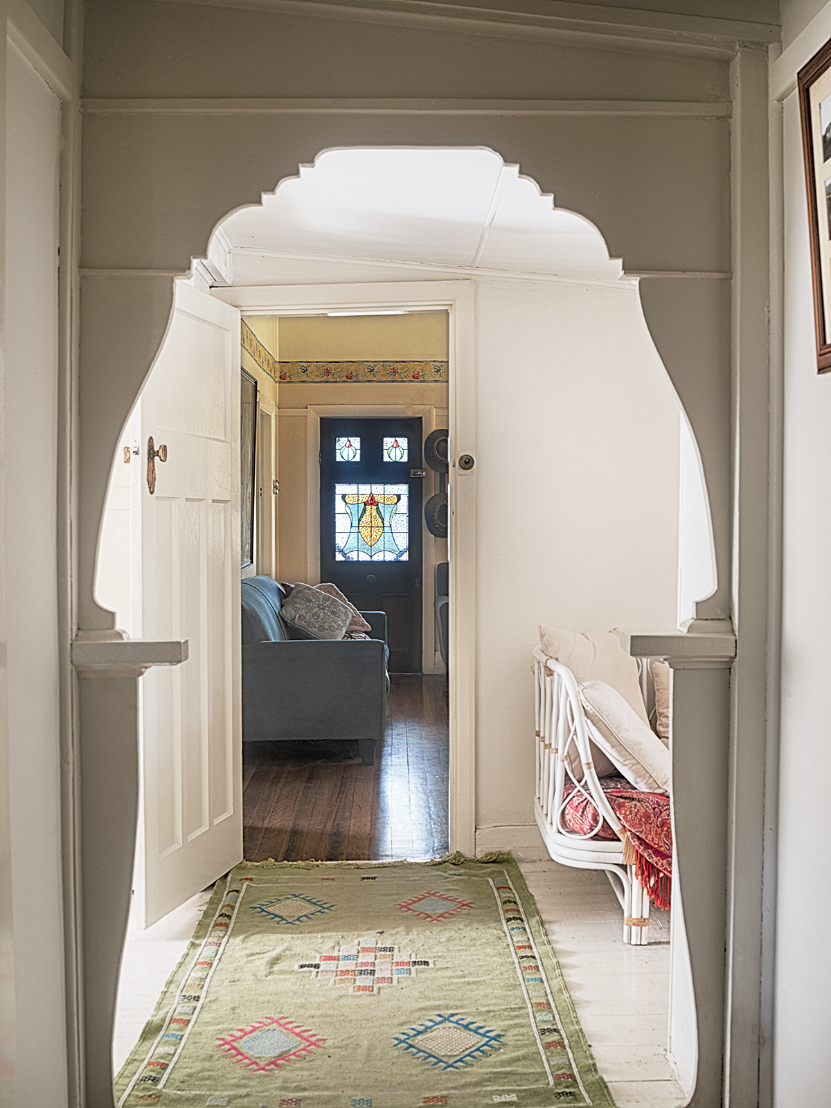 A view of the main hallway through to the loungeroom and main entrance