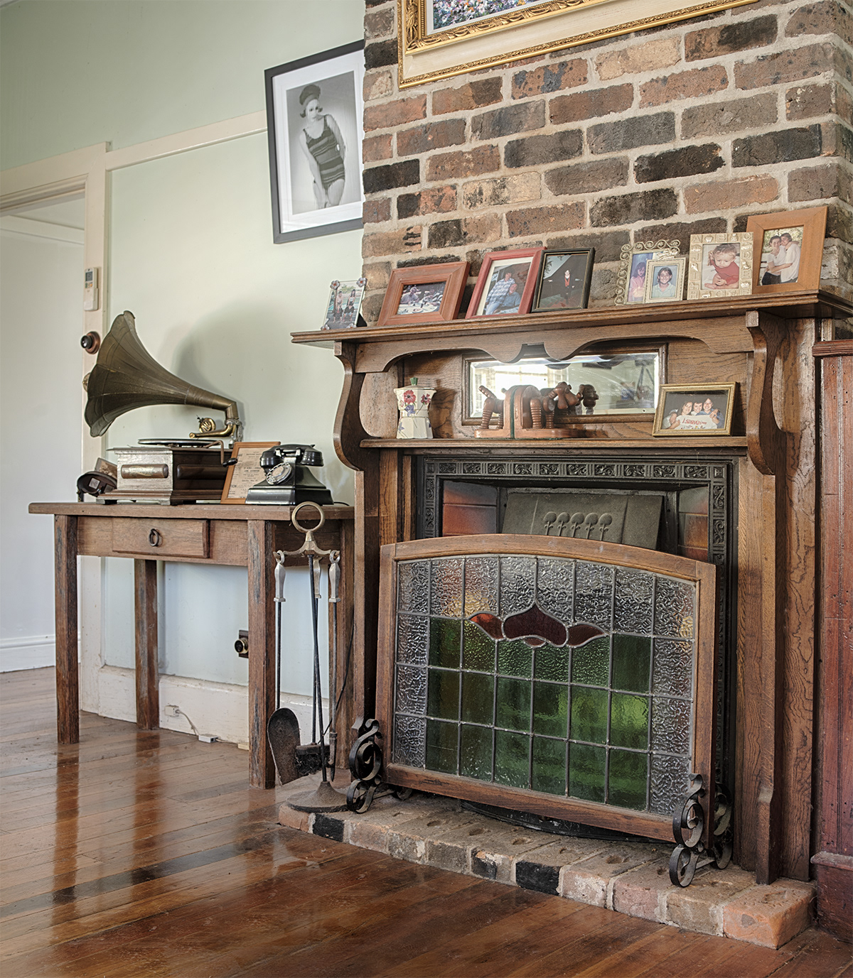 The fireplace in our drawing room complete with convict bricks that make up the hearth