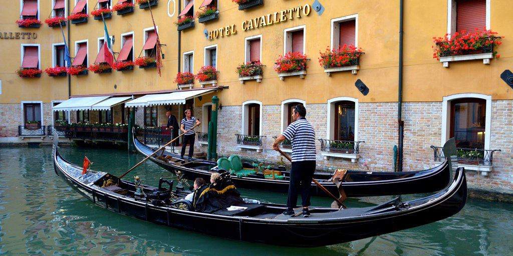 Gondoliers, Venice, Italy.