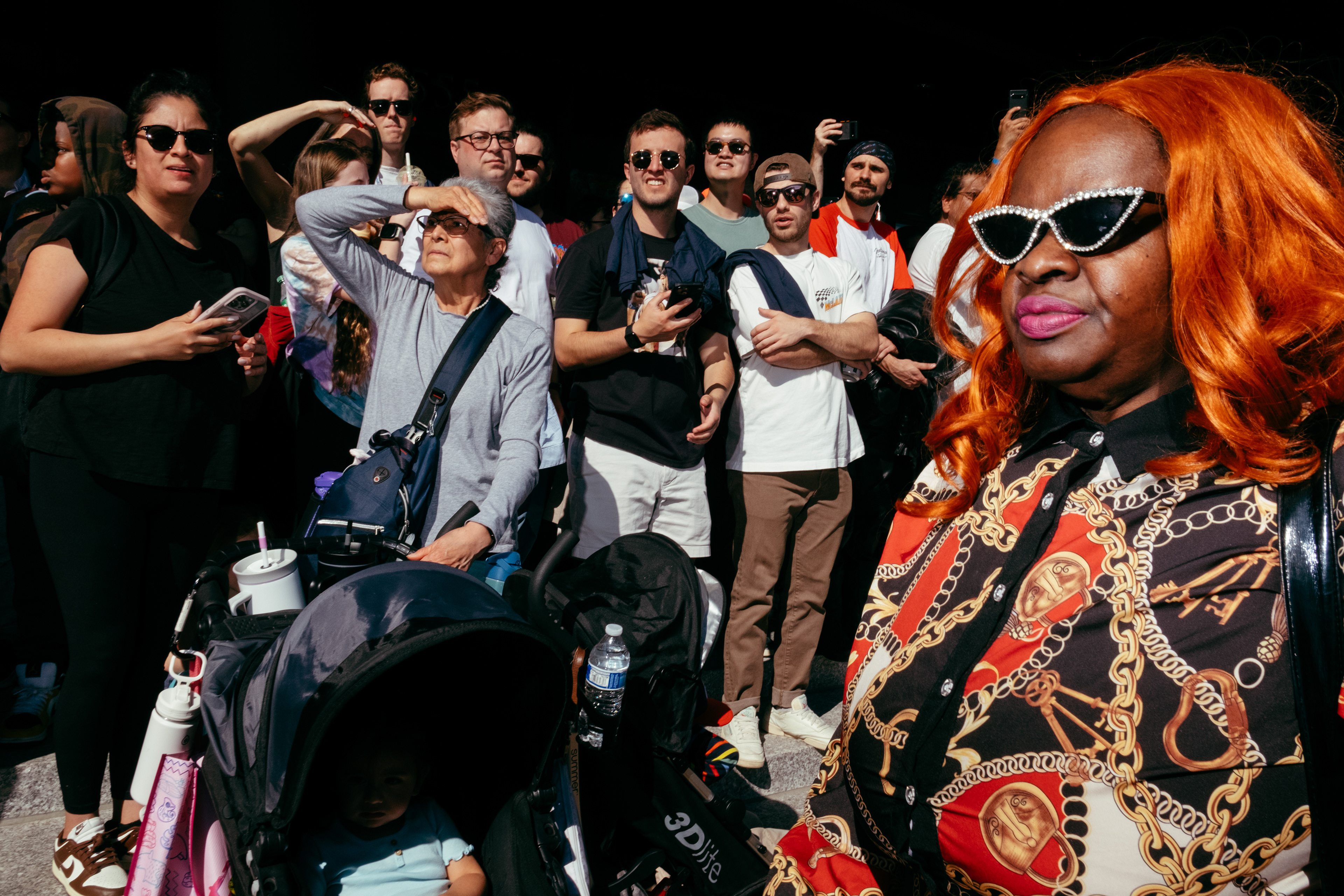 Crowd watching a Formula One car race down Penn Ave, Washington DC, 2024