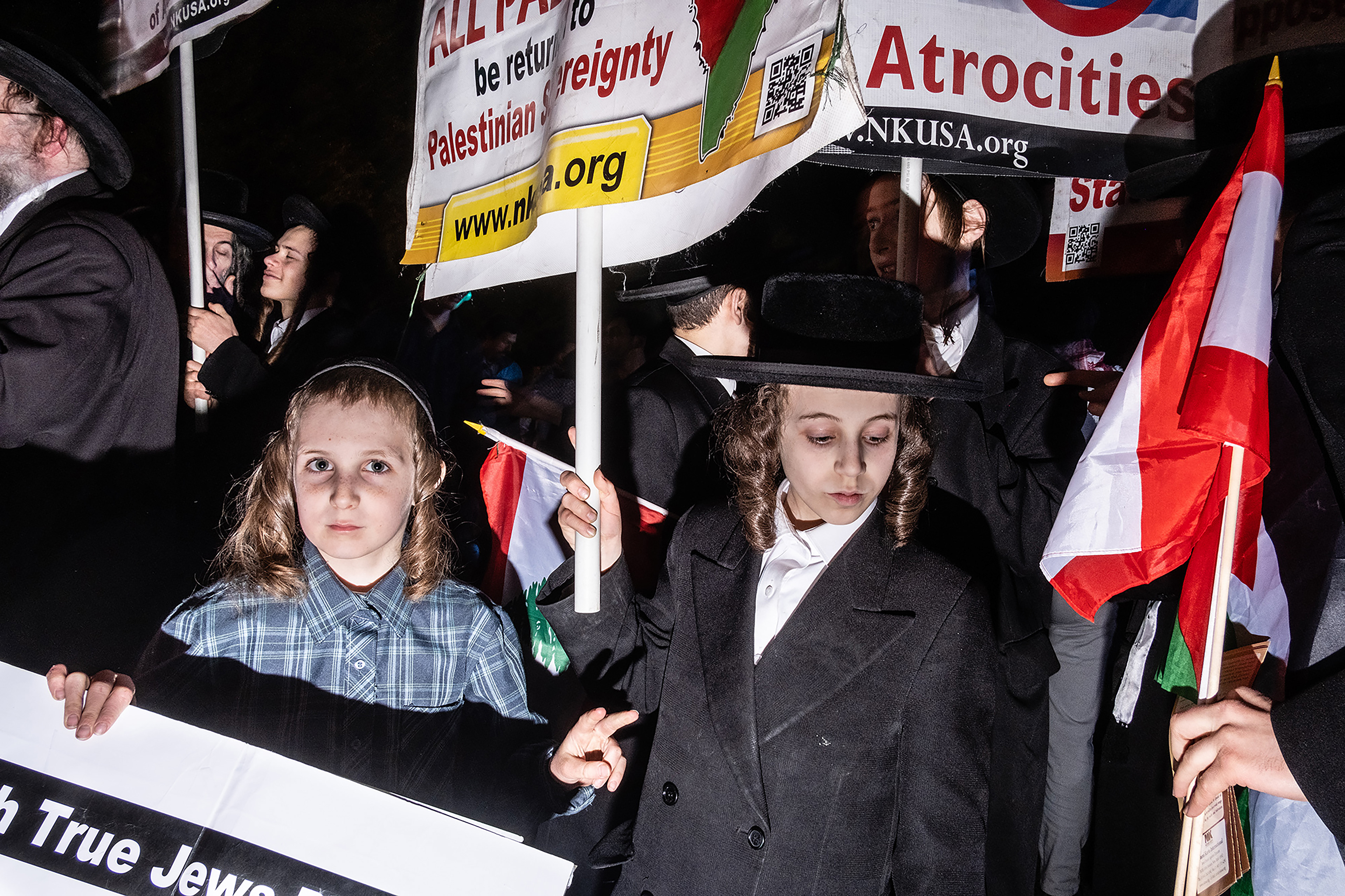 Members of Neturei Karta protest the war on Gaza outside of Kamala Harris's final rally before the election in Washington DC, 10/29/24 
