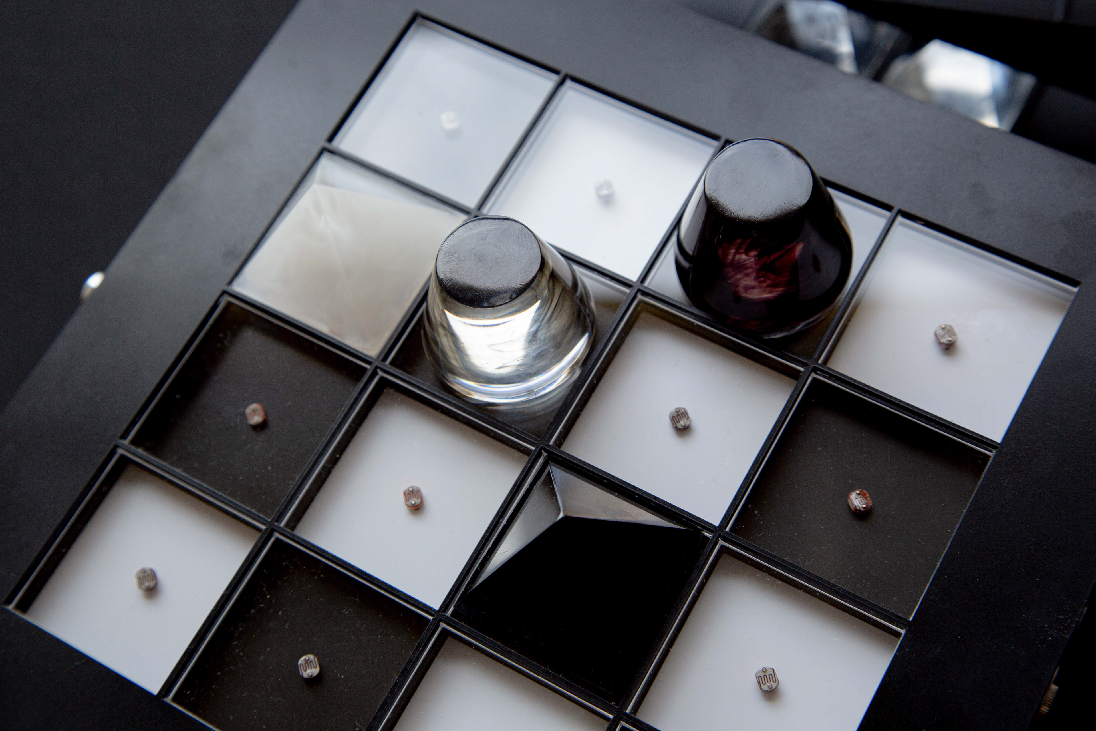 The pieces were cast in epoxy. Different transparency filter light in many many ways witch influence the sound.