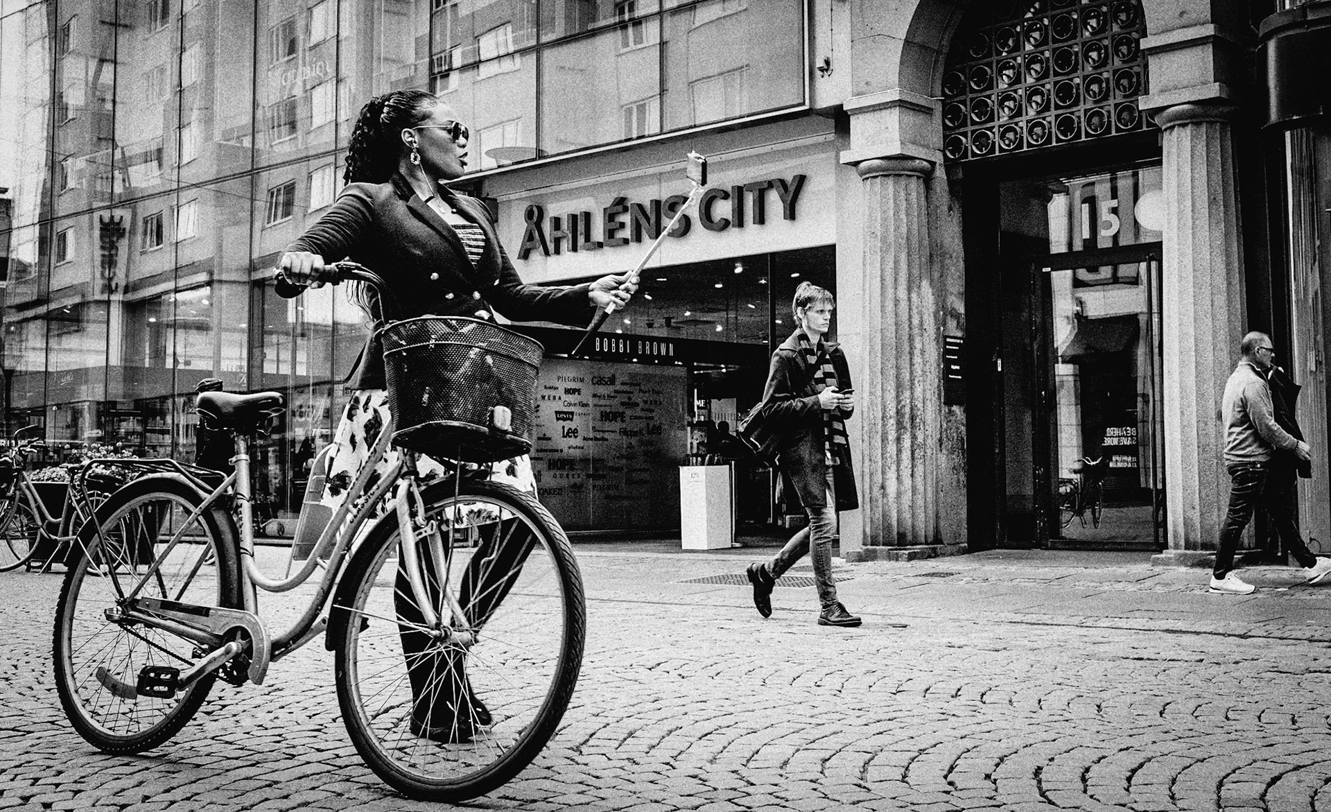 This self centered laydy  walked by paying no attentions to anyone, but her self.