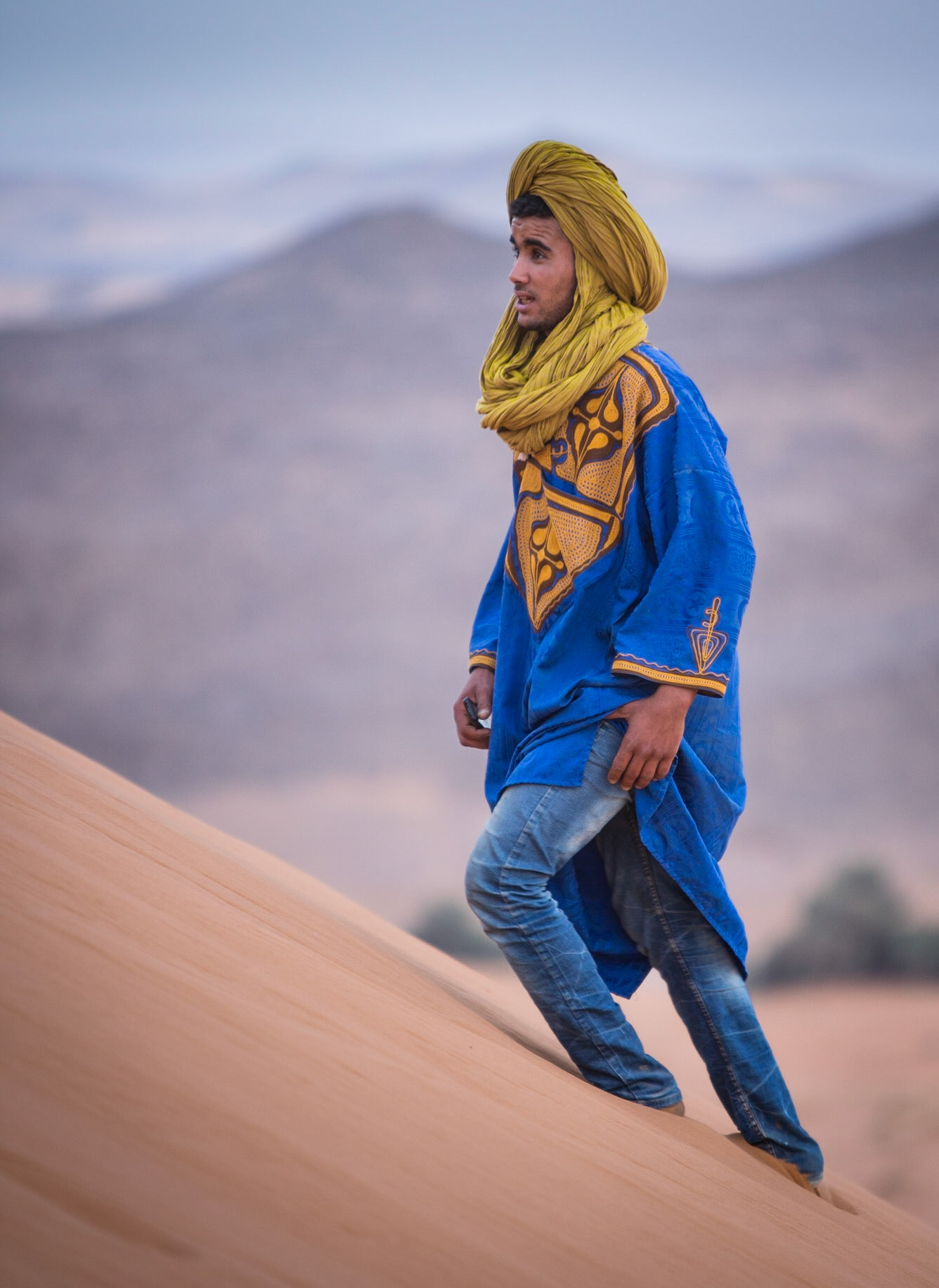 Merzouga is a small village in southeastern Morocco, about 55 kilometers from Erfoud, and about 50 kilometers from the Algerian border.The village is known for its proximity to Erg Chebbi, a Saharan broad area of desert covered with wind-swept sand. It is a true delight to climb to the top of the highest dune to watch the sunset, among the friendly Berbers and other travelers.
