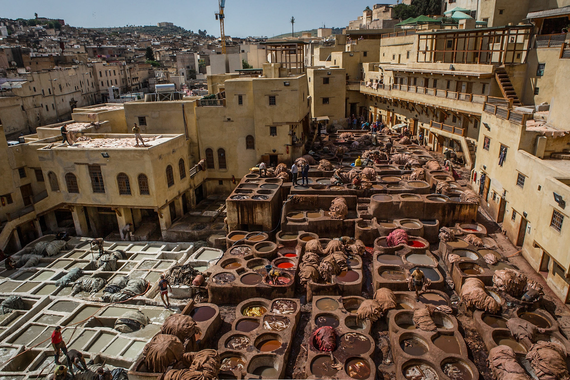 Chouara Tannery is one of the three tanneries in the city of Fez, Morocco. It was built in the 11th century and it is the largest tannery in the city. From its inception, the tanning industry in Fez has been continually operating in the same fashion as it did in the early centuries. Today, tanning is considered one of the main tourist attractions. The tanneries are packed with the round stone vessels filled with dye or white liquids for softening the hides. The leather goods produced in the tanneries are exported around the world.