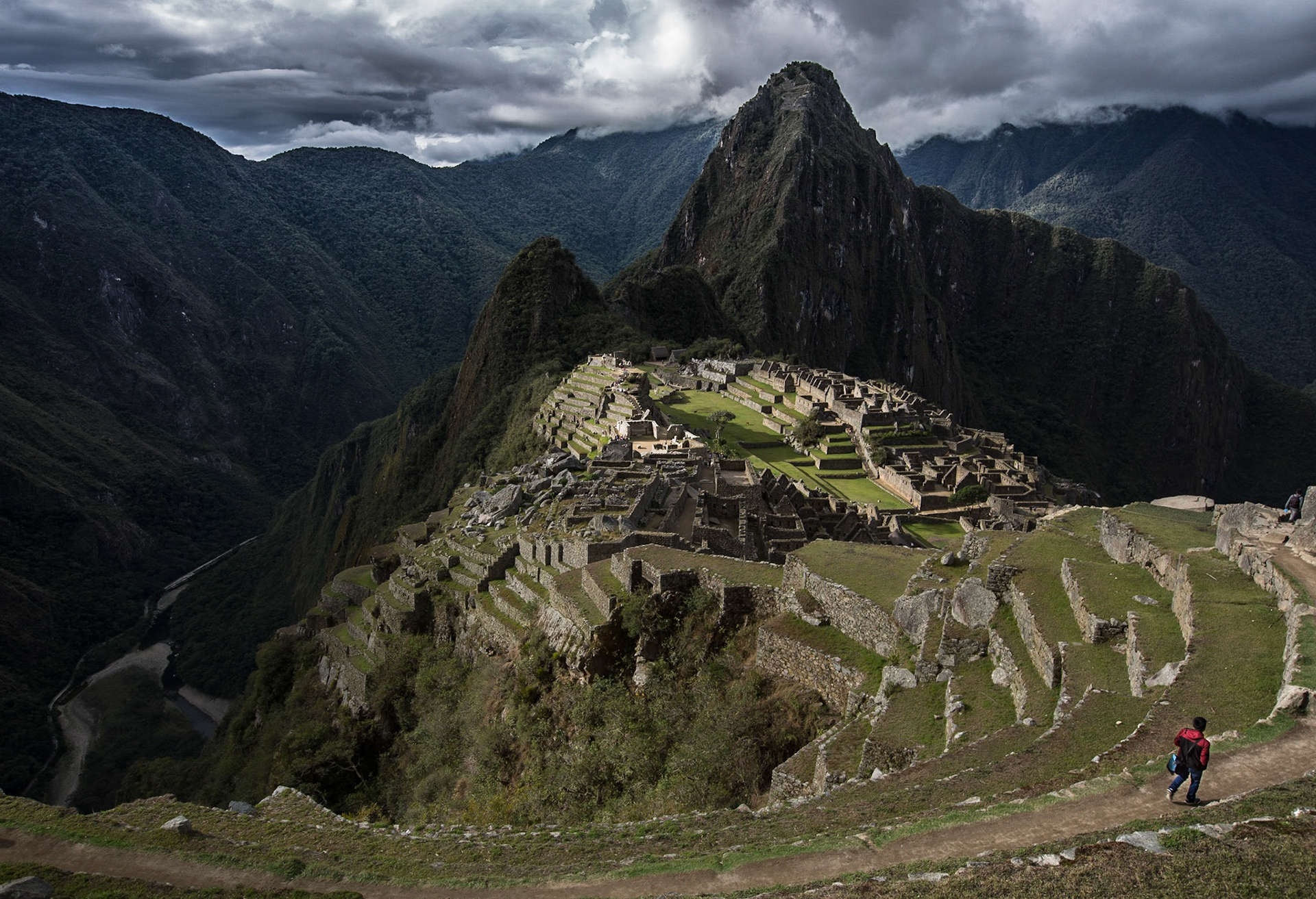 Machu Picchu, Peru, stands 2,430 m above sea-level, in the middle of a tropical mountain forest, in an extraordinarily beautiful setting.  I stayed in the site for a full day: from 06:00 (just before sunrise), enjoying and picturing an amazing mixture of light and fog, until 17:00 (closing time) when you almost have the ruins to yourself...