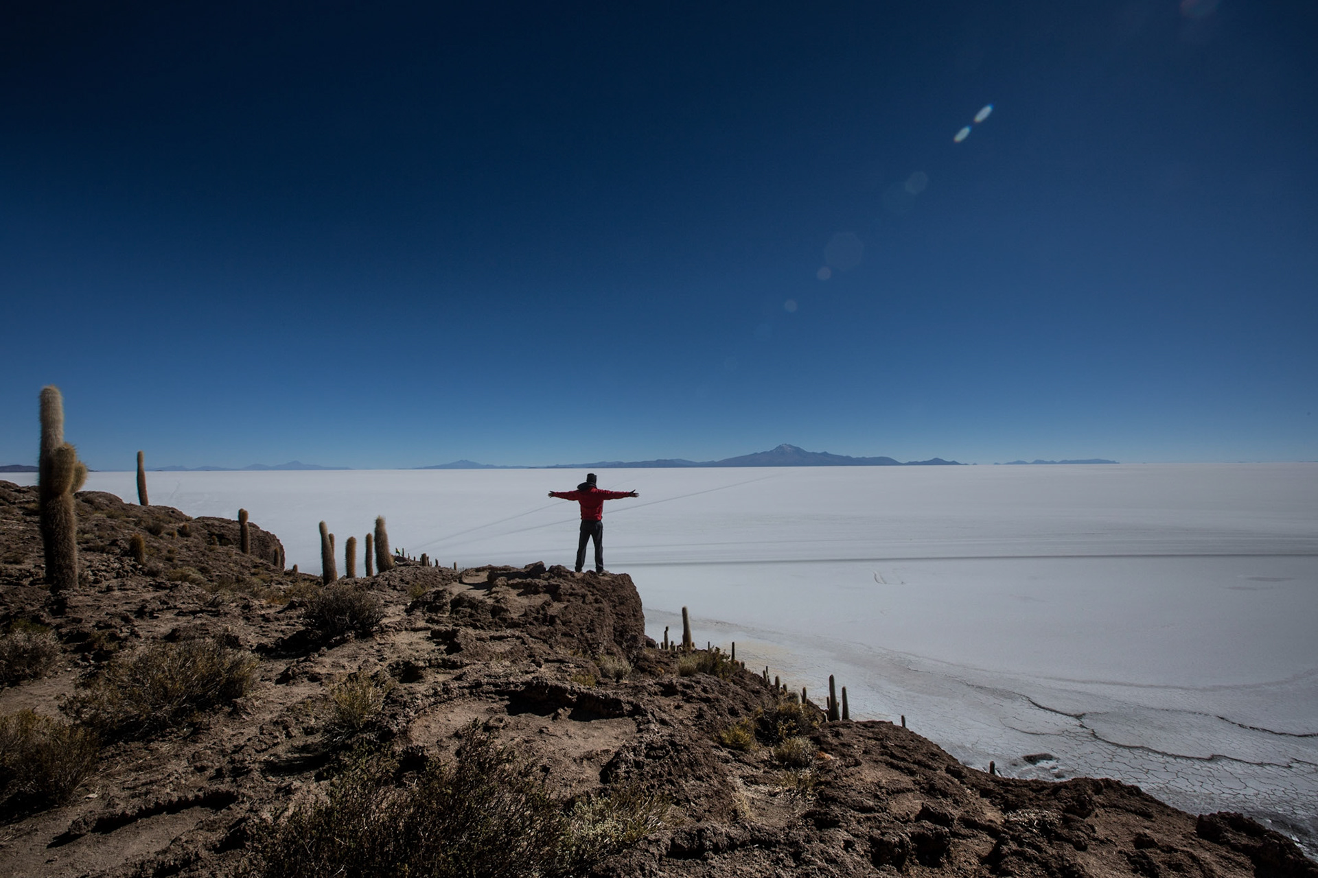 Isla Incahuasi is a hilly and rocky outcrop of land and former island in Bolivia situated in the middle of Salar de Uyuni, the world's largest salt flat, at an elevation of 3,656 meters. Incahuasi hosts gigantic cacti and there are unusual and fragile coral-like structures and deposits that often consist of fossils and algae. The place is the top of the remains of an ancient volcano, which was submerged when the area was part of a giant prehistoric lake, roughly 40,000 years ago.