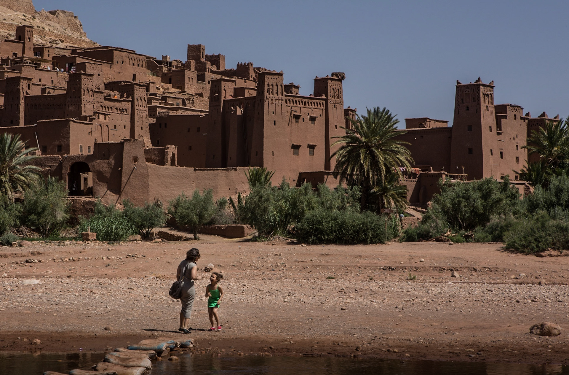 Aït Benhaddou is a fortified village (ksar in Arabic), along the former caravan route between the Sahara and Marrakech in present-day Morocco. Most citizens attracted by the tourist trade live in more modern dwellings in a village on the other side of the river, although there are four families still living in the ancient village. Inside the walls of the ksar are half a dozen Kasbahs or merchants houses which constitute a great example of Moroccan earthen clay architecture.Aït Benhaddou is a UNESCO World Heritage Site since 1987 and several films have been shot there, including Gladiator and the TV series Game of Thrones.We had a blast with our daughter wandering around this iconic location.