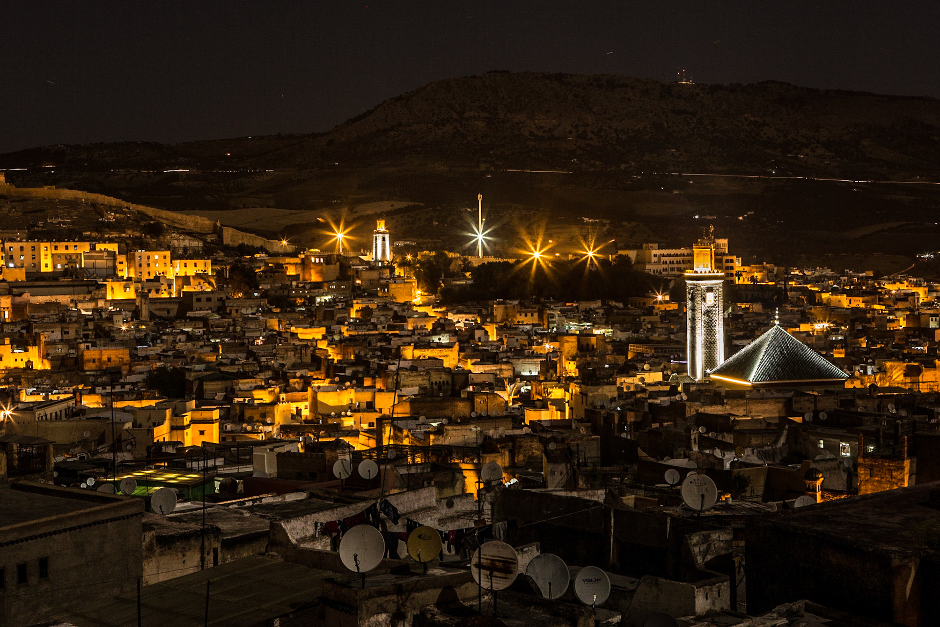 Fez is the third largest city of Morocco, after Casablanca and Rabat.Fez was the capital city of modern Morocco until 1925. It is listed as a World Heritage Site and is believed to be one of the world's largest urban pedestrian zones (car-free areas) with more than 8,000 small streets in the medina) old town). This shot was taken at night from the rooftop of a Riad located at the heart of the medina.