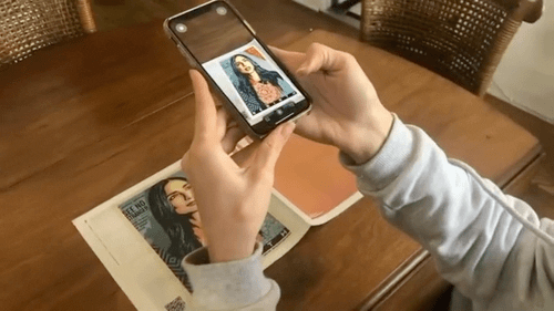 AR TRIGGERS POSTER TO ANIMATE. 