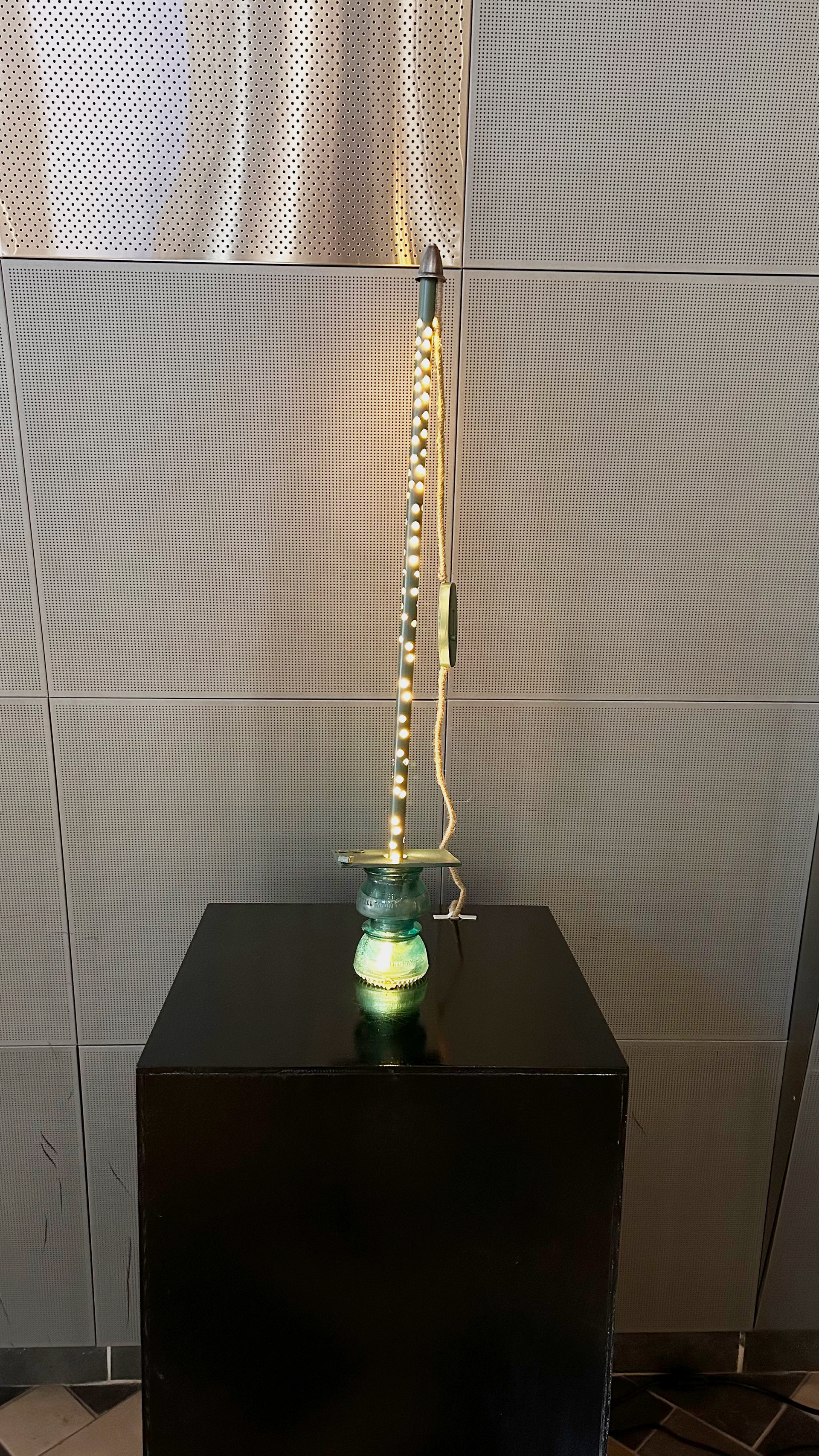 Plundering Plungers, 2024 Glass insulator, led strip lights, organic hemp string wires, spray paint, & tape Sculptor 3/3 8 x 34 inches ID 240-413194225