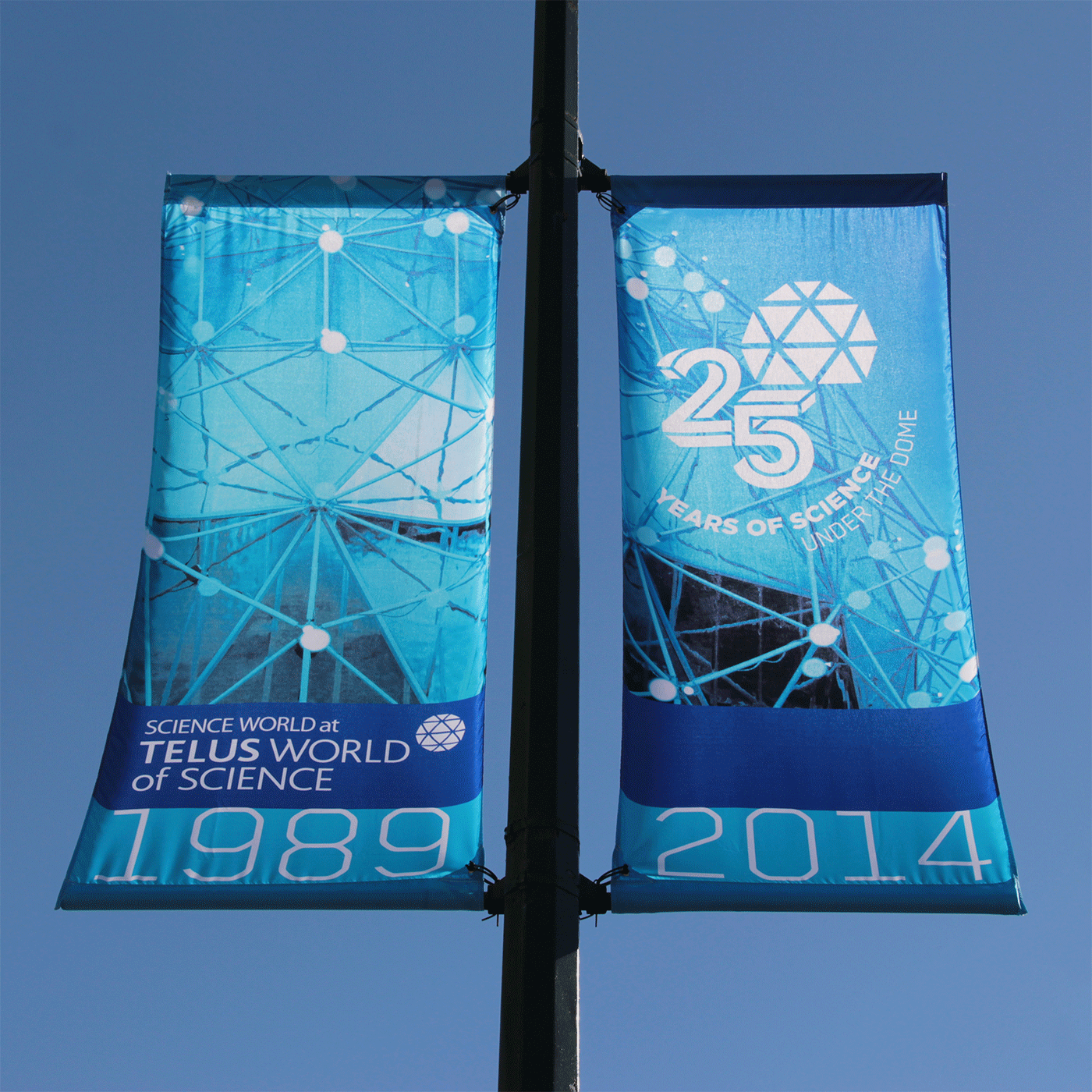 Street banners, displayed along Quebec street in front of TELUS World of Science.