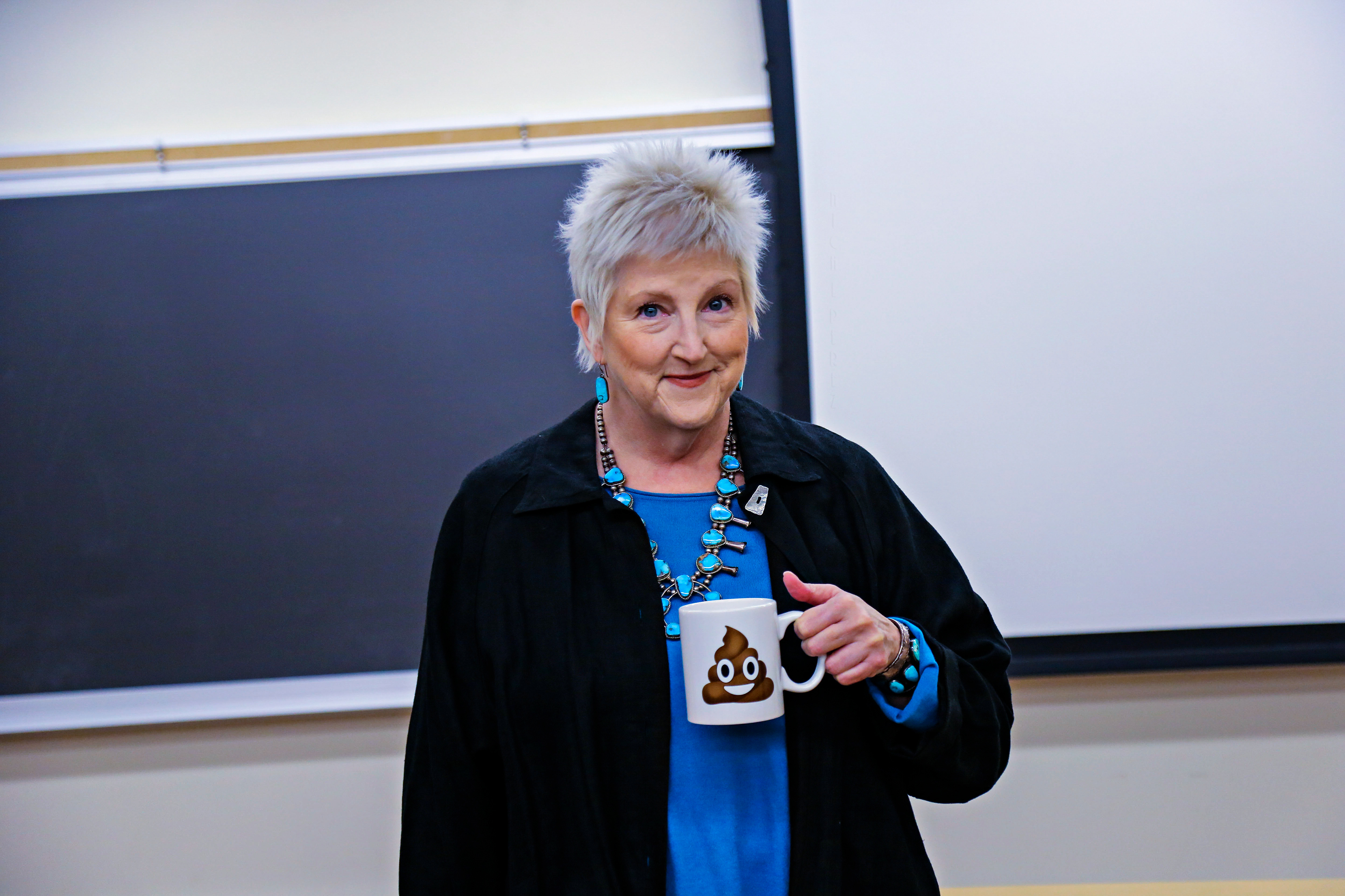 The professor, Kate McIntyre and her cup, behind the scenes of "Philosophical Approach to Enlightenment"