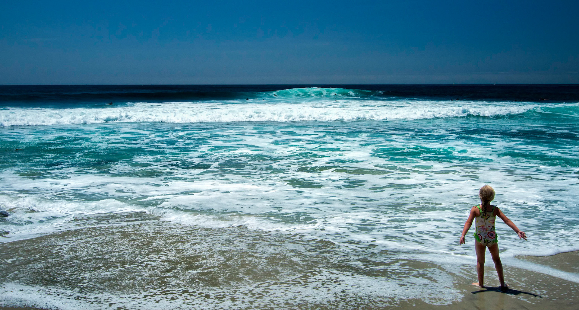 Little Girl and Surfers