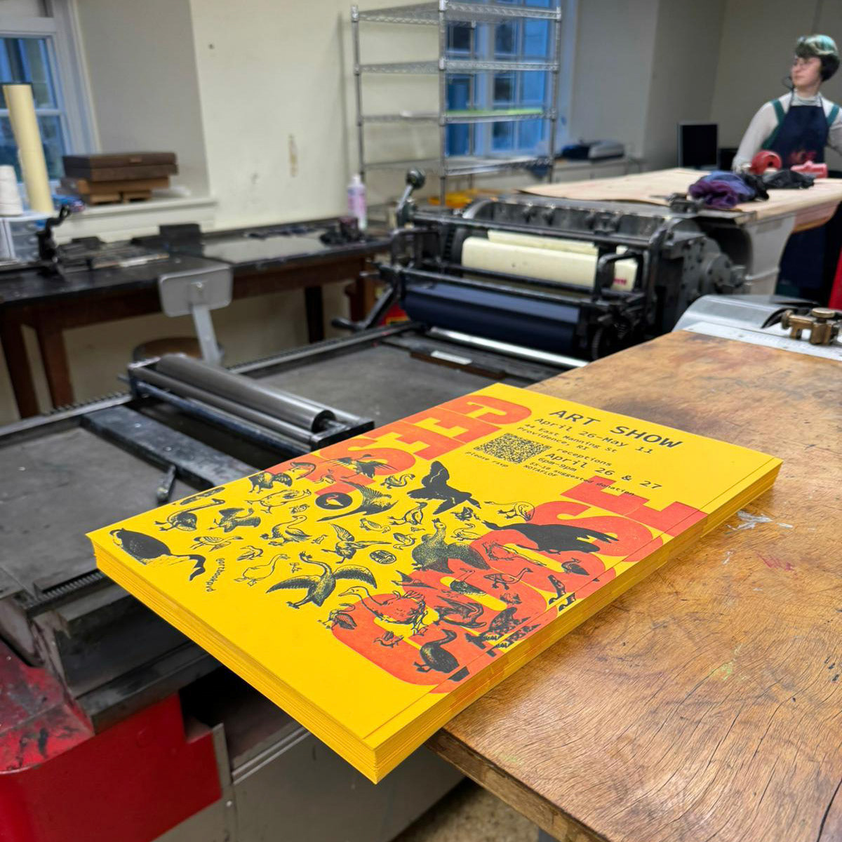 freshly printed stack, me in the background - photo taken by Areez Khan