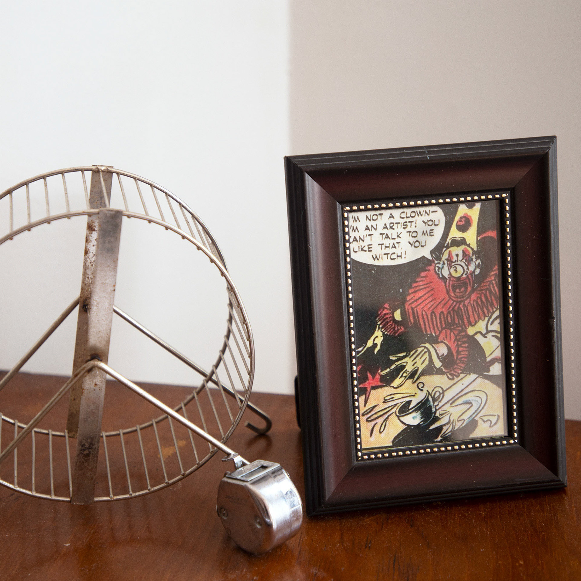 throughout the space were framed printouts of clown art from various digital archives