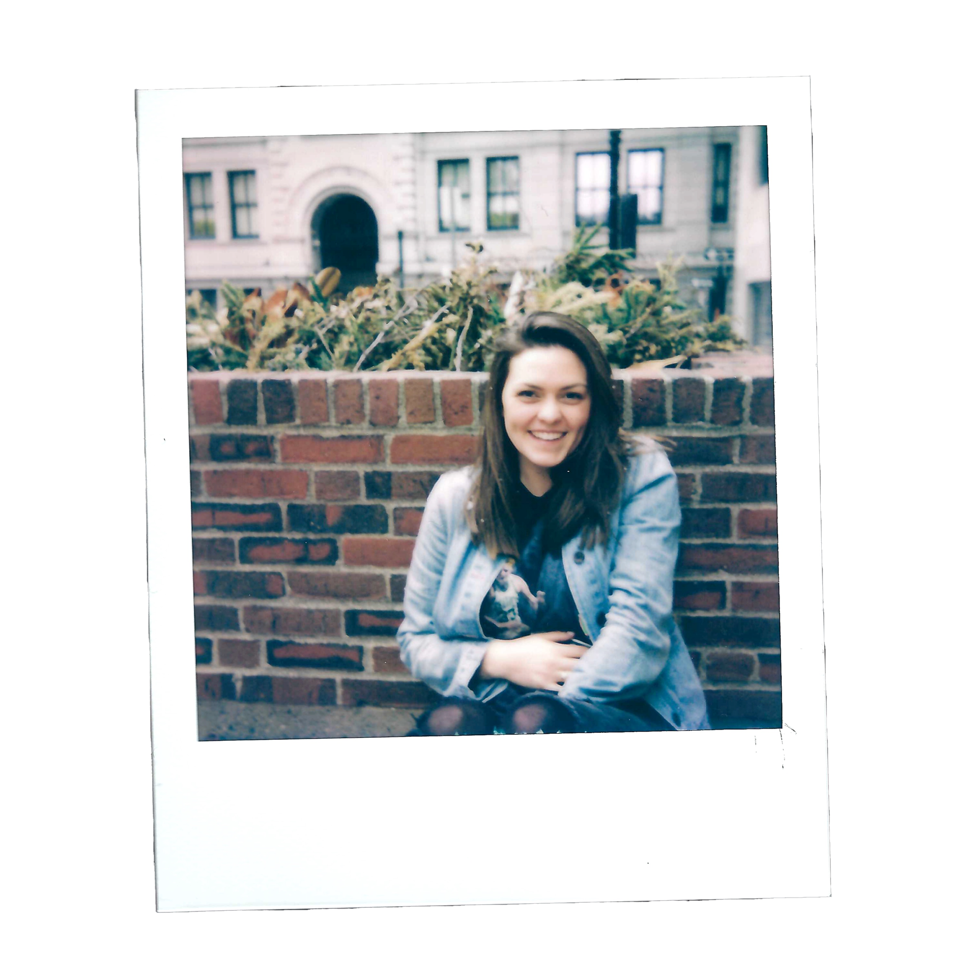 A polaroid of me outdoors and smiling