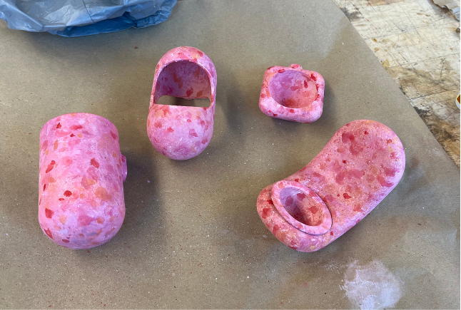 Additional paint added to mimic the speckled, recycled plastic of ecoBirdy. 