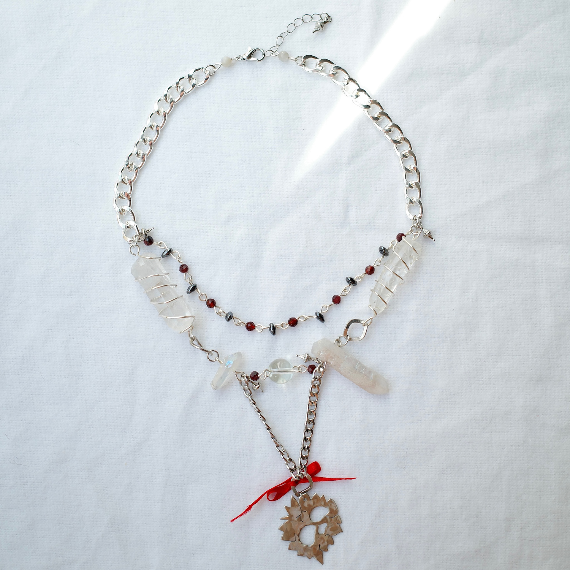 "skully boy" necklace - nickel silver pendant, assorted beads, quartz crystals - july 2023