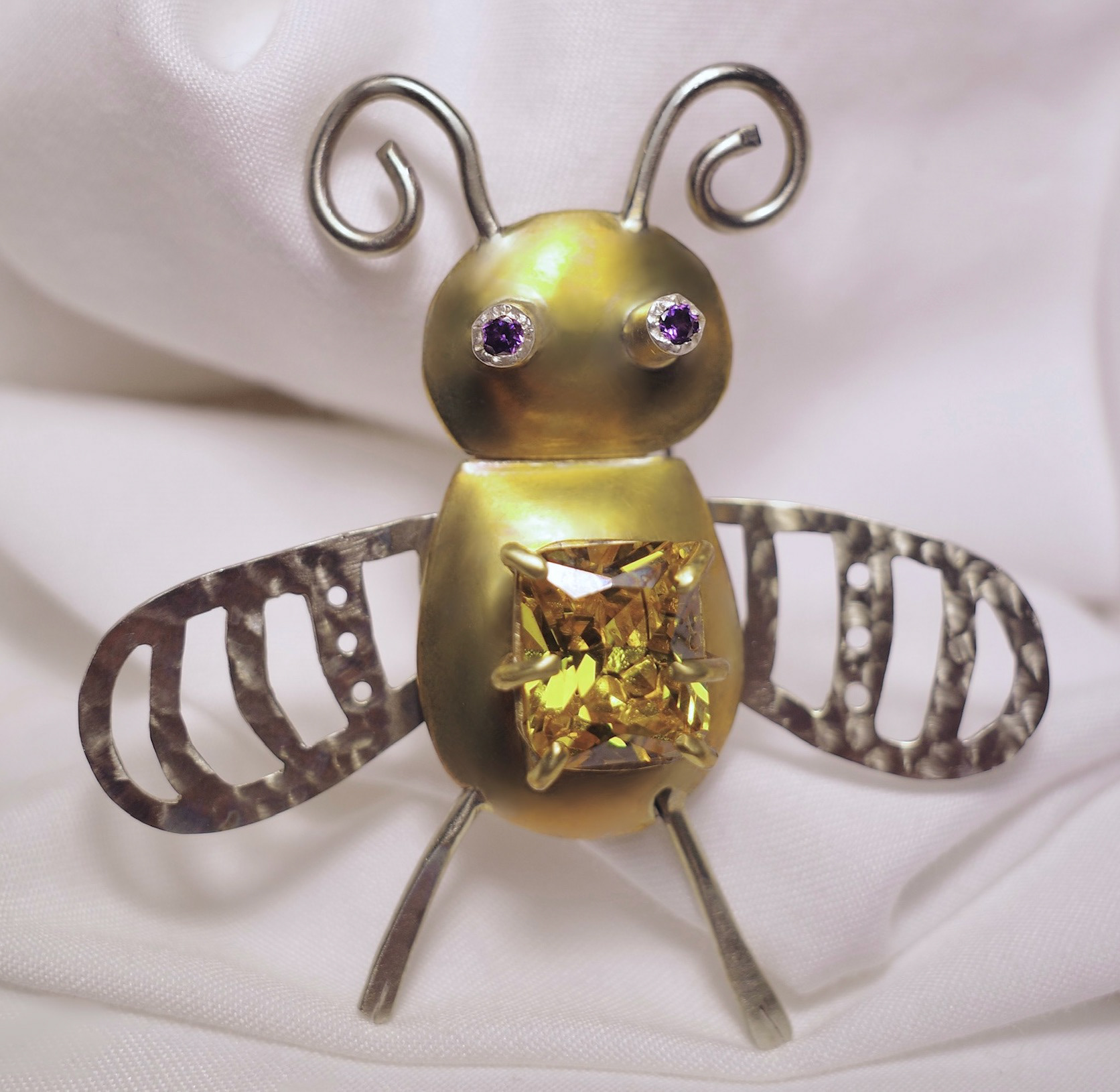 "bumble brooch" - brass, nickel silver, sterling silver tubing, amethyst and yellow topaz stones - october 2023