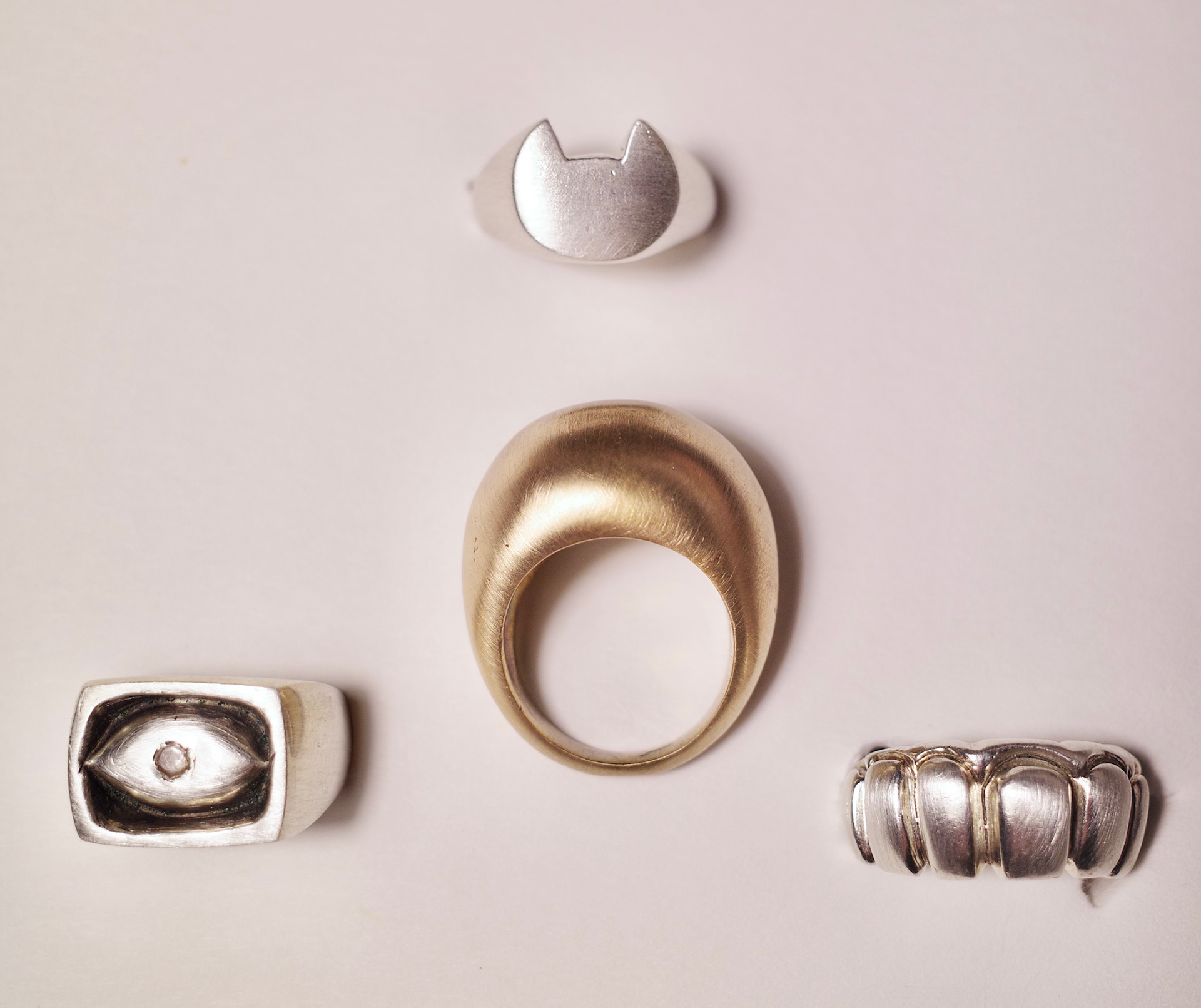 assortment of rings - all hand carved in wax, cast in sterling silver and ancient bronze - 2023-2024