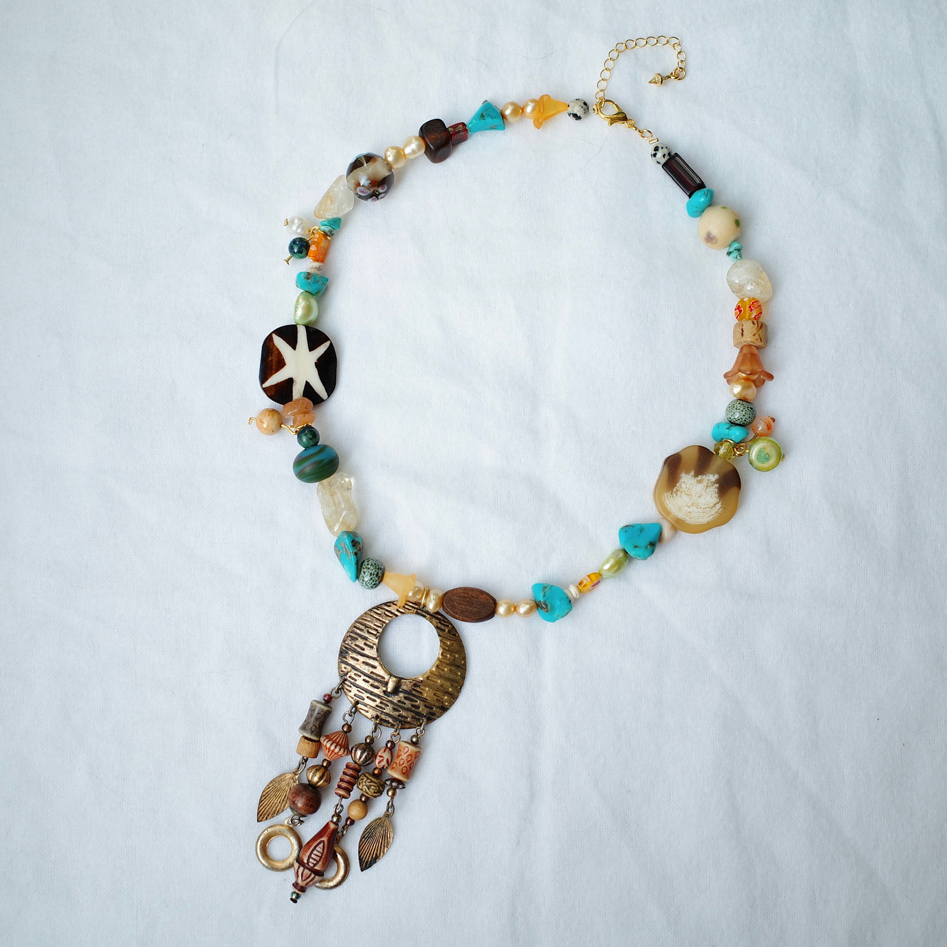 "tree hugger" necklace - assorted beads, second hand pendant - june 2023