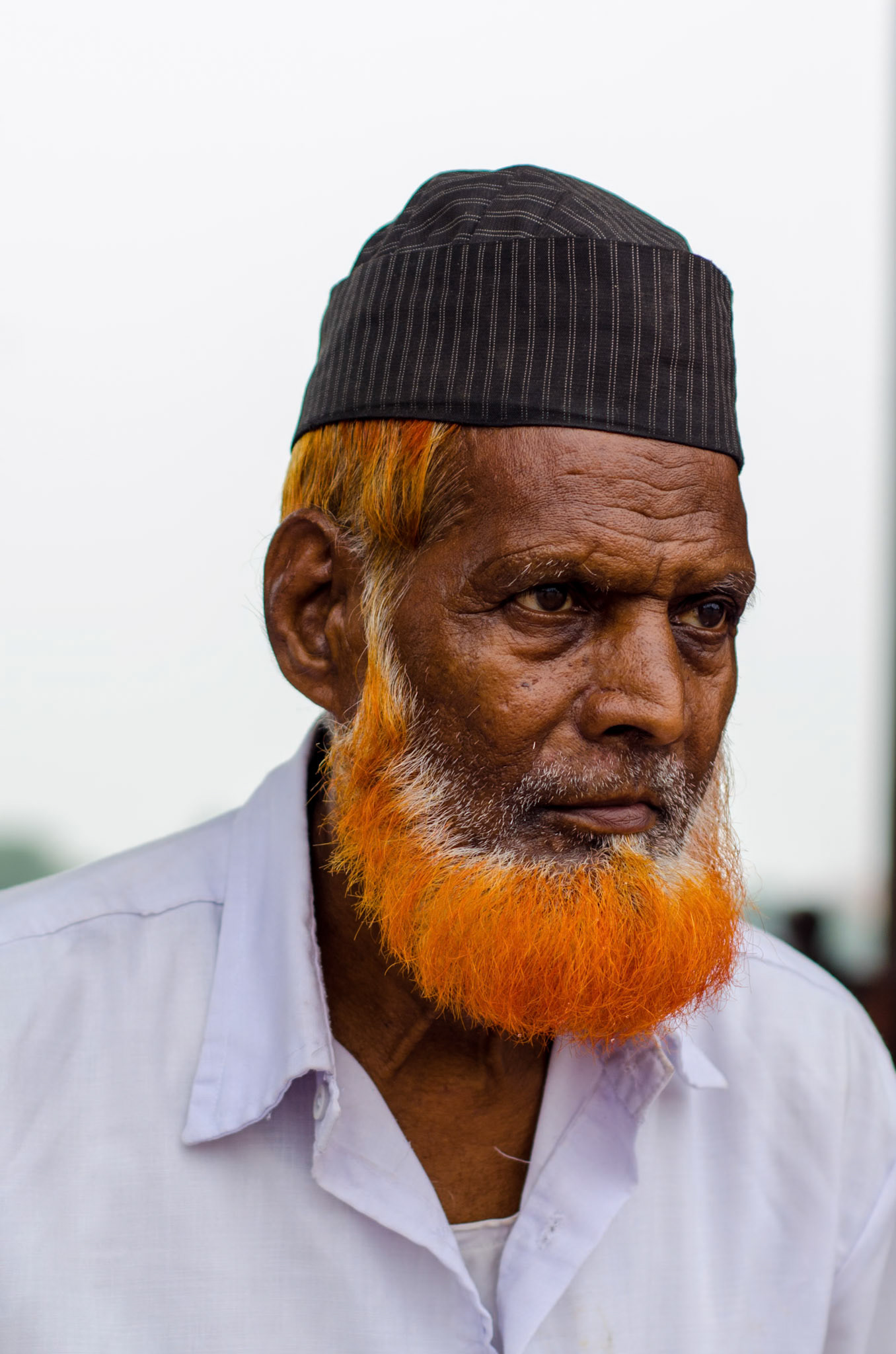 Portrait of a Muslim man with henna dyed beard