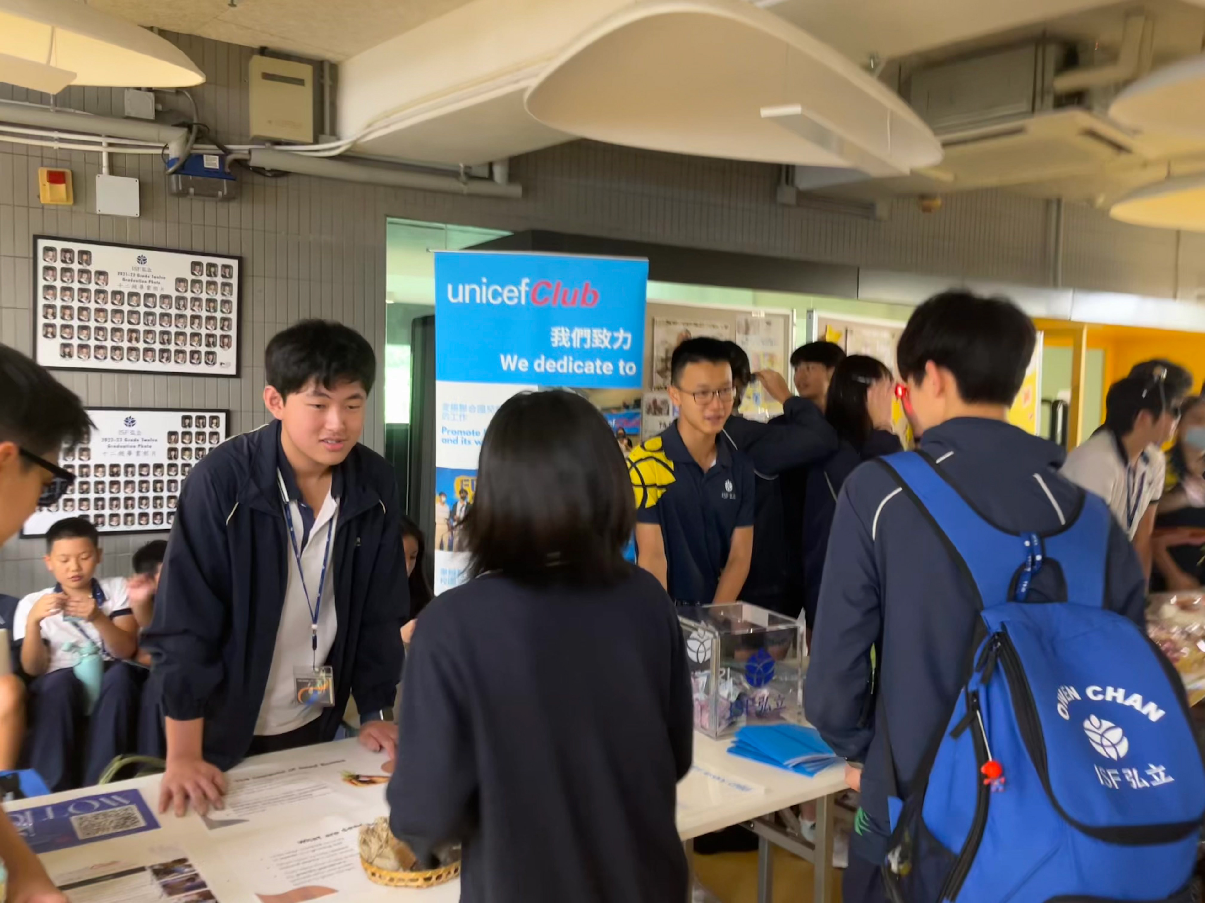 UNICEF stall, selling seed bombs during house fundraising week; won Top Fundraising Award.
