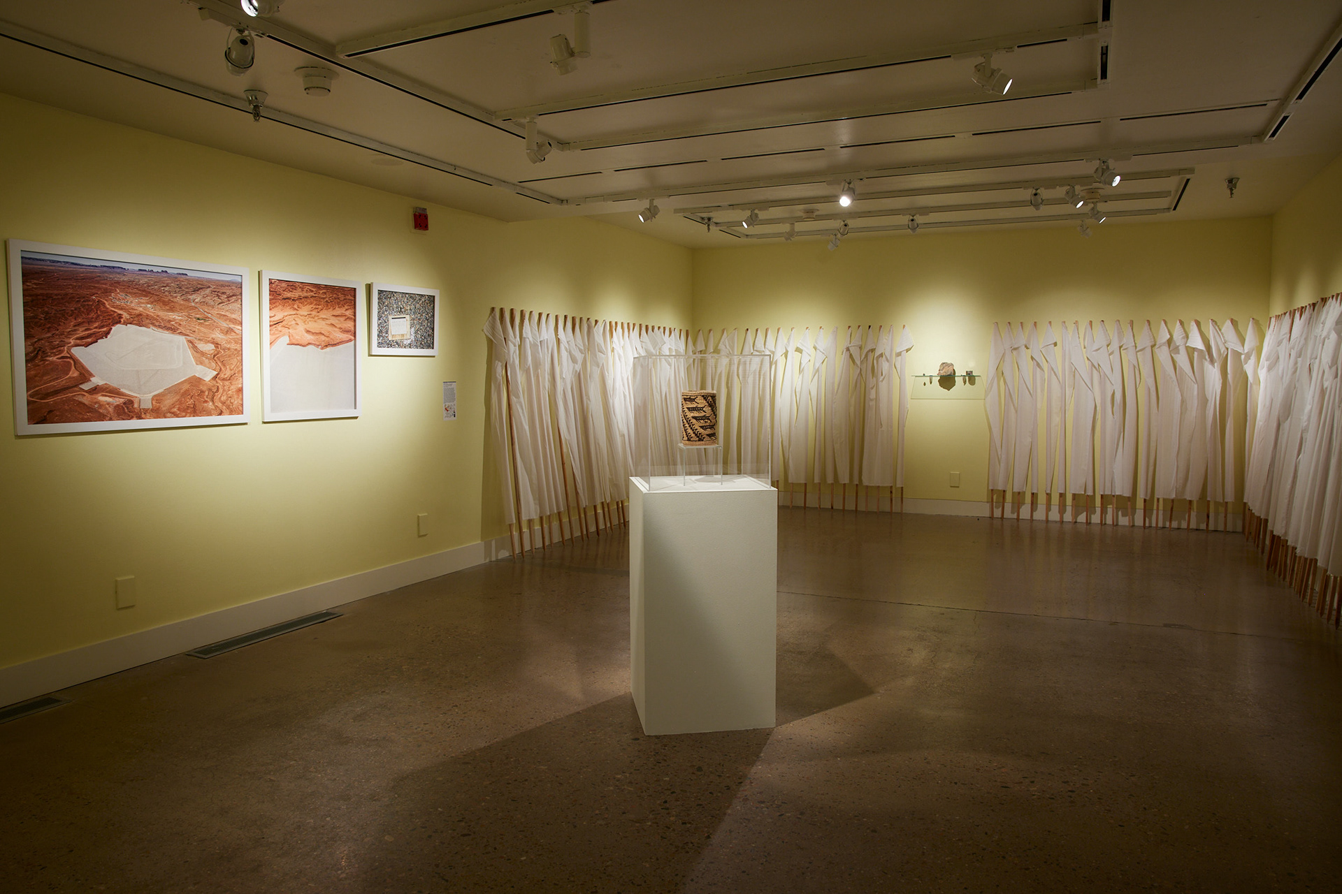 Left to right: Will Willson, Mexican Hat Disposal Cell, Navajo Nation, 2020-2021. Pat Courtney Gold, Sturgeon Basket, 2005. Bonnie Devine, Phenomenology, 2015. Image by Brad Trone.