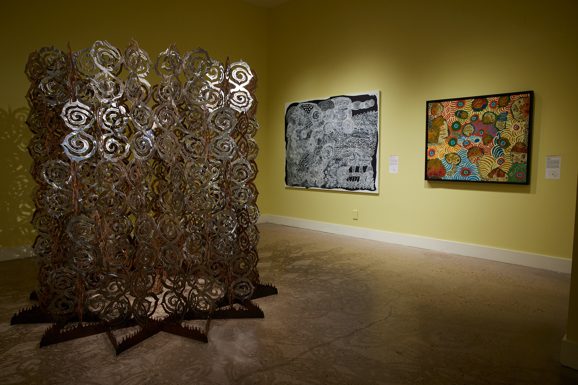 Left to right: Kohei Fujito, The Singing of the Needle, 2021. Betty Muffler, Ngangkari Ngura (Healing Country), 2019. Karrika Belle Davidson, Maralinga Bomb, 2016. Image by Brad Trone.