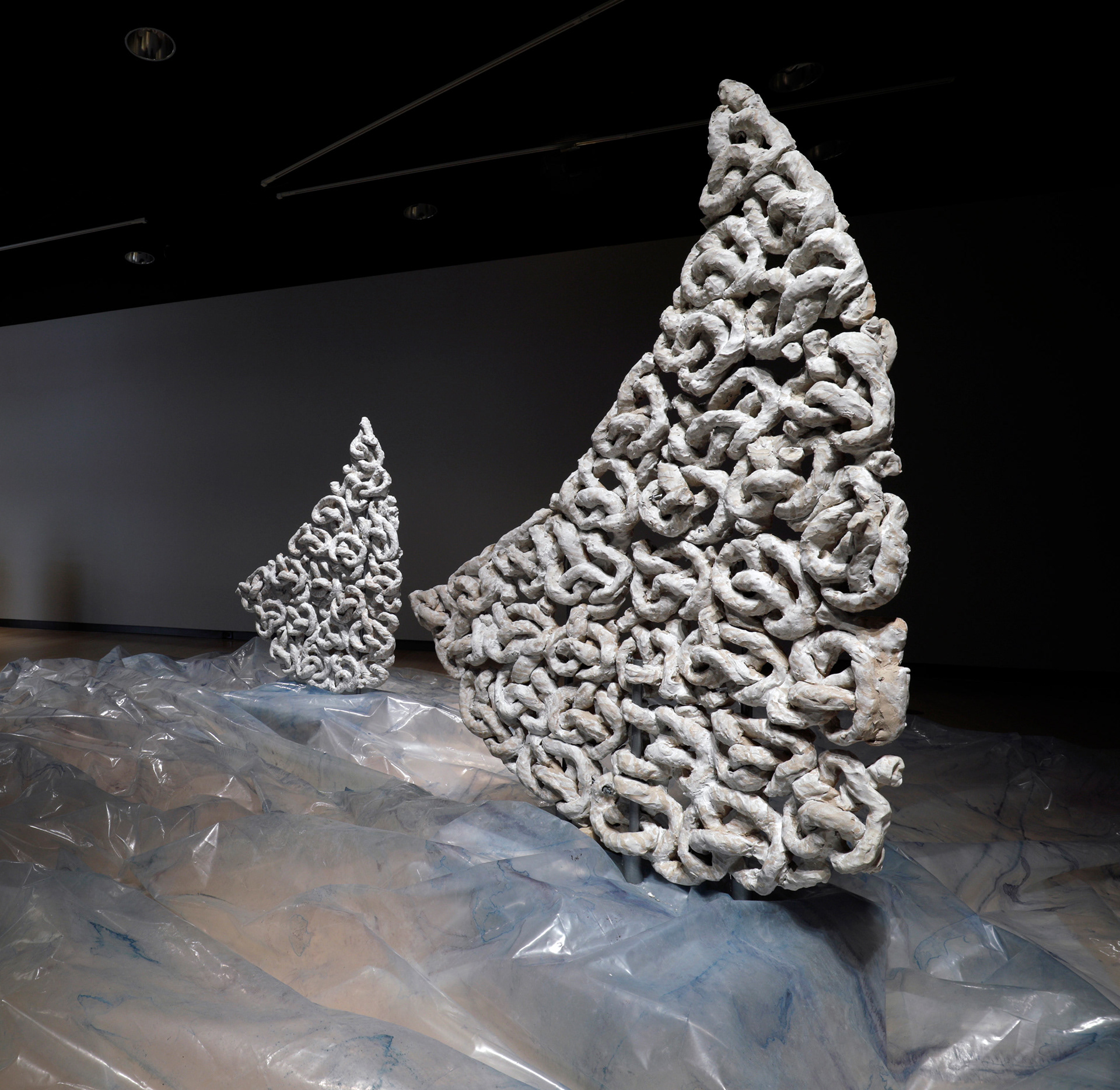 Fool's Gold: By 2050 there will be more plastic in the ocean than living creatures. Ceramic sails, knotted in rope patterns derived from fishing nets and ocean buoys, trawl the depths of a plastic ocean (made out of salvaged plastic sheeting from an abandoned greenhouse).