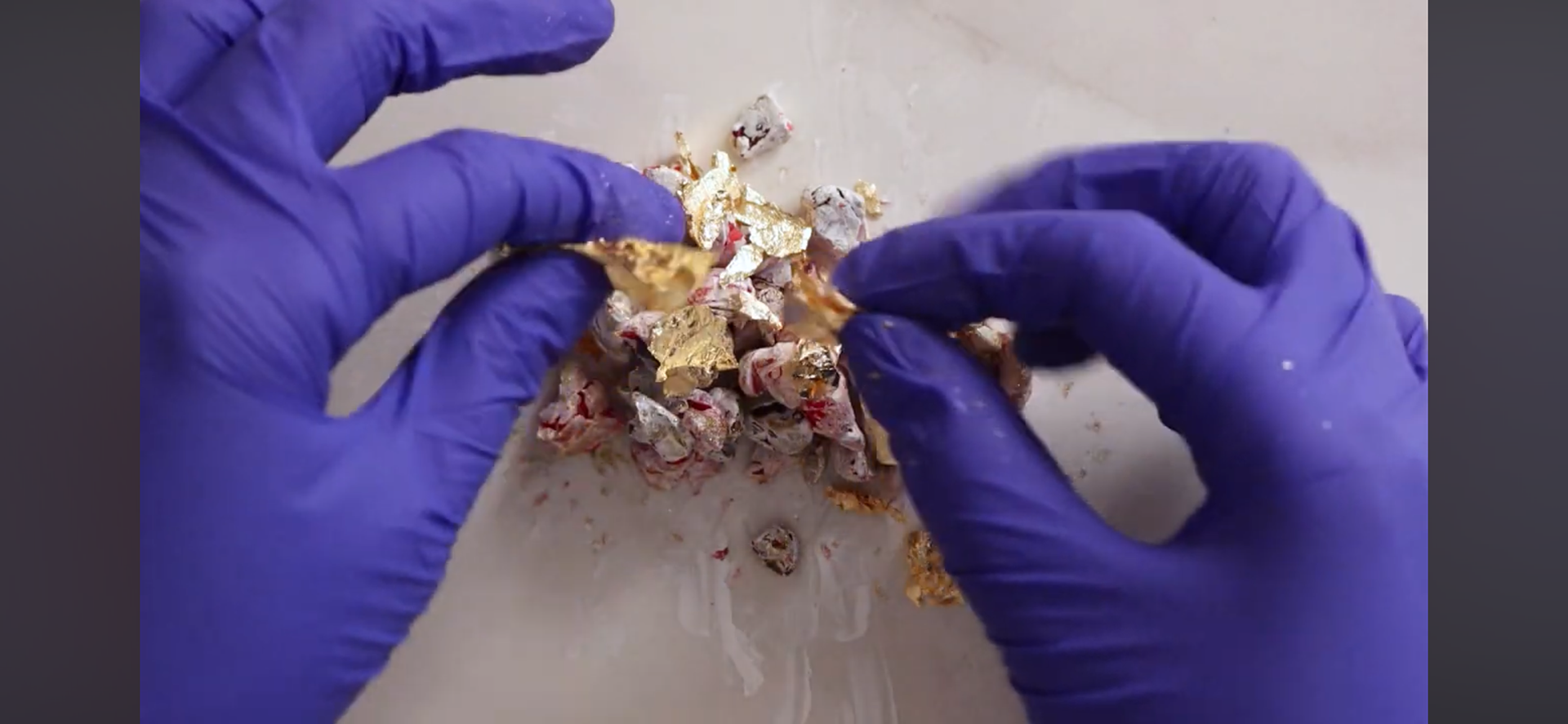 An example of the process I used to add color and effects to the clay before applying it on the rocks.