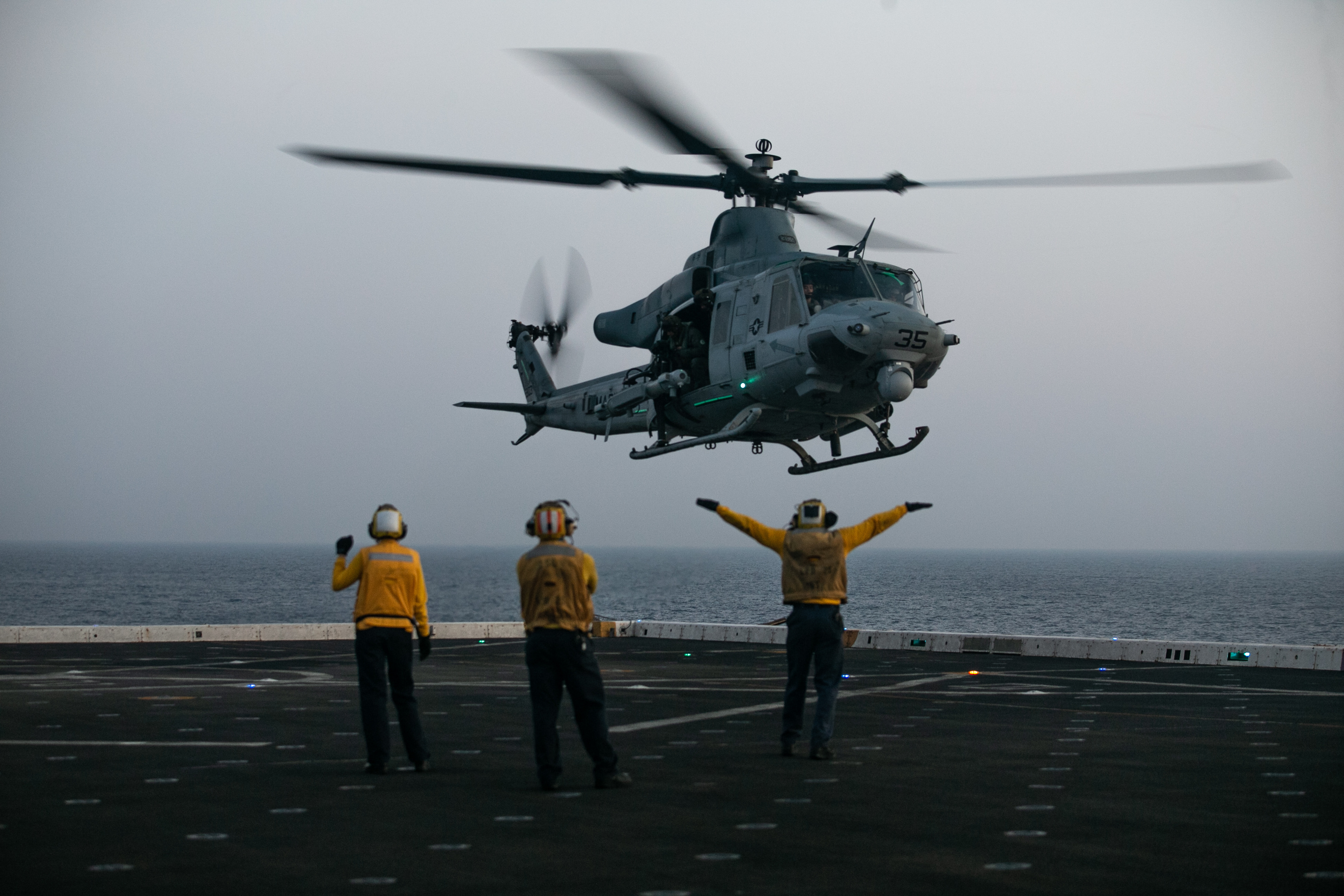PACIFIC OCEAN (Oct. 5, 2020) ‒ U.S. Sailors assigned to the amphibious transport dock ship USS Somerset (LPD 25) signal to a Marine Corps UH-1Y Venom with Marine Medium Tiltrotor Squadron 164 (Reinforced), 15th Marine Expeditionary Unit, for landing during deck-landing qualifications. The Makin Island Amphibious Ready Group and the 15th MEU are currently conducting routine operations in the eastern Pacific Ocean.