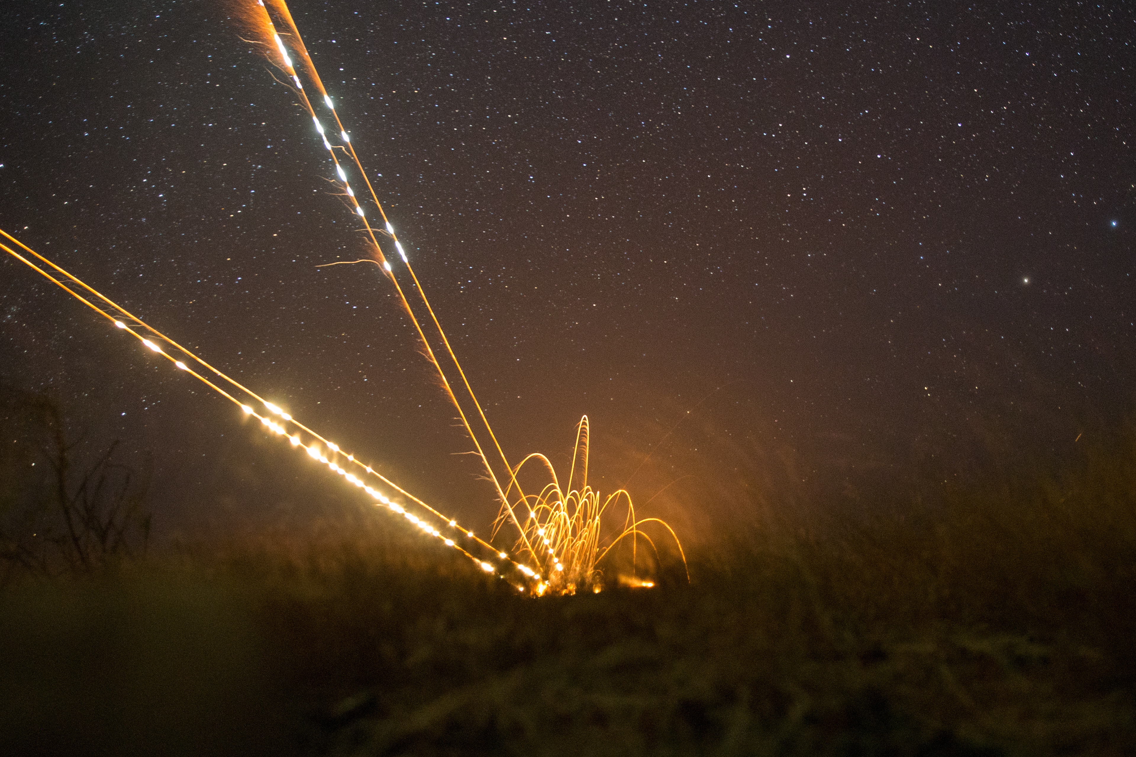 BALEDOGLE MILITARY AIRFIELD, Somalia (Jan. 7, 2021) – Rocket impacts from a U.S. Air Force AH-6 Little Bird assigned to Joint Special Operations Aviation Detachment illuminate the night. The U.S. remains committed to our work in East Africa and Somalia, to include building and maintaining regional security, continuing to pressure al-Qaeda’s franchise al-Shabaab and advancing mutual interests with our East African partners.