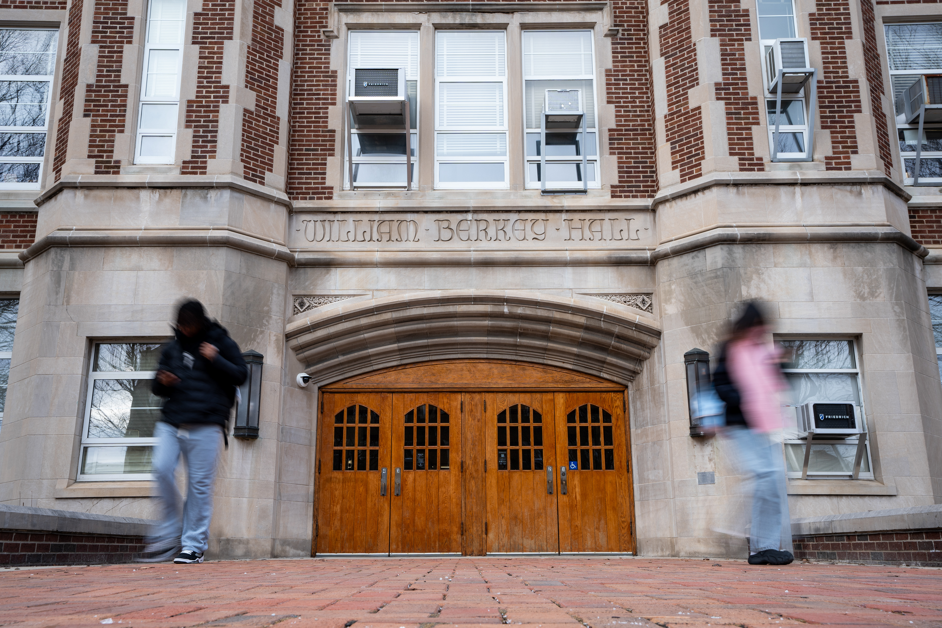 Students walk outside of Berkey Hall in East Lansing, Michigan on February 11, 2025.