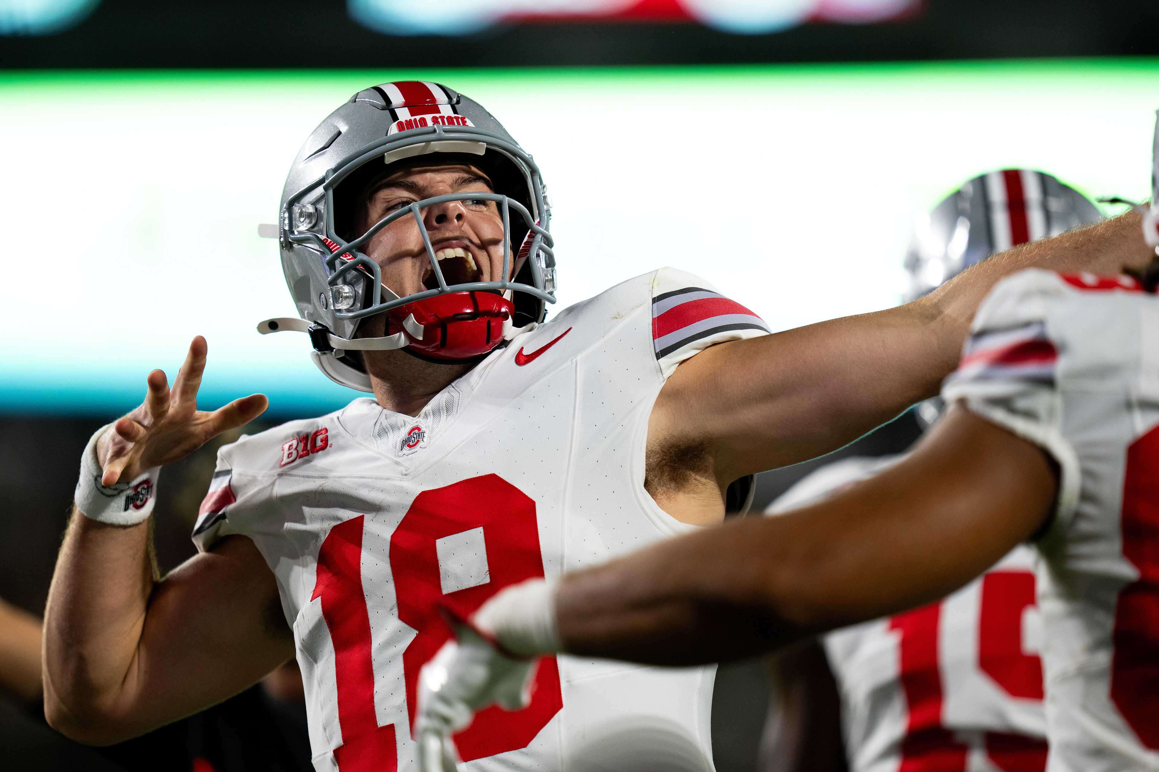 Ohio State graduate quarterback Will Howard (18) celebrates after completing a scoring drive during the game against the Ohio State Buckeyes held in the Spartan Stadium on Sept. 29, 2024. Despite a competitive first half, the Spartans fell 38-7 to the Buckeyes.