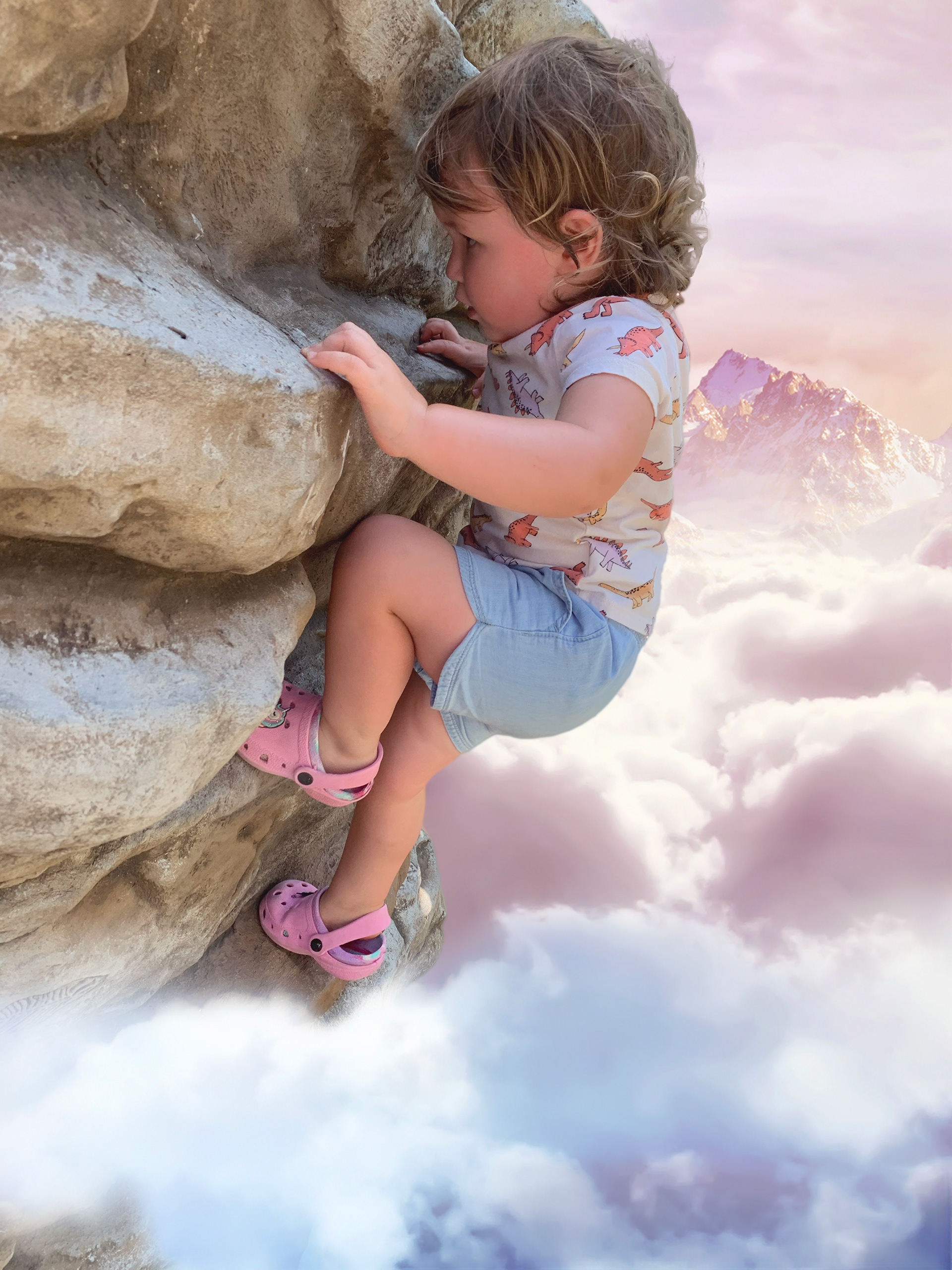 Image of girl photoshopped to look like she is climbing a mountain
