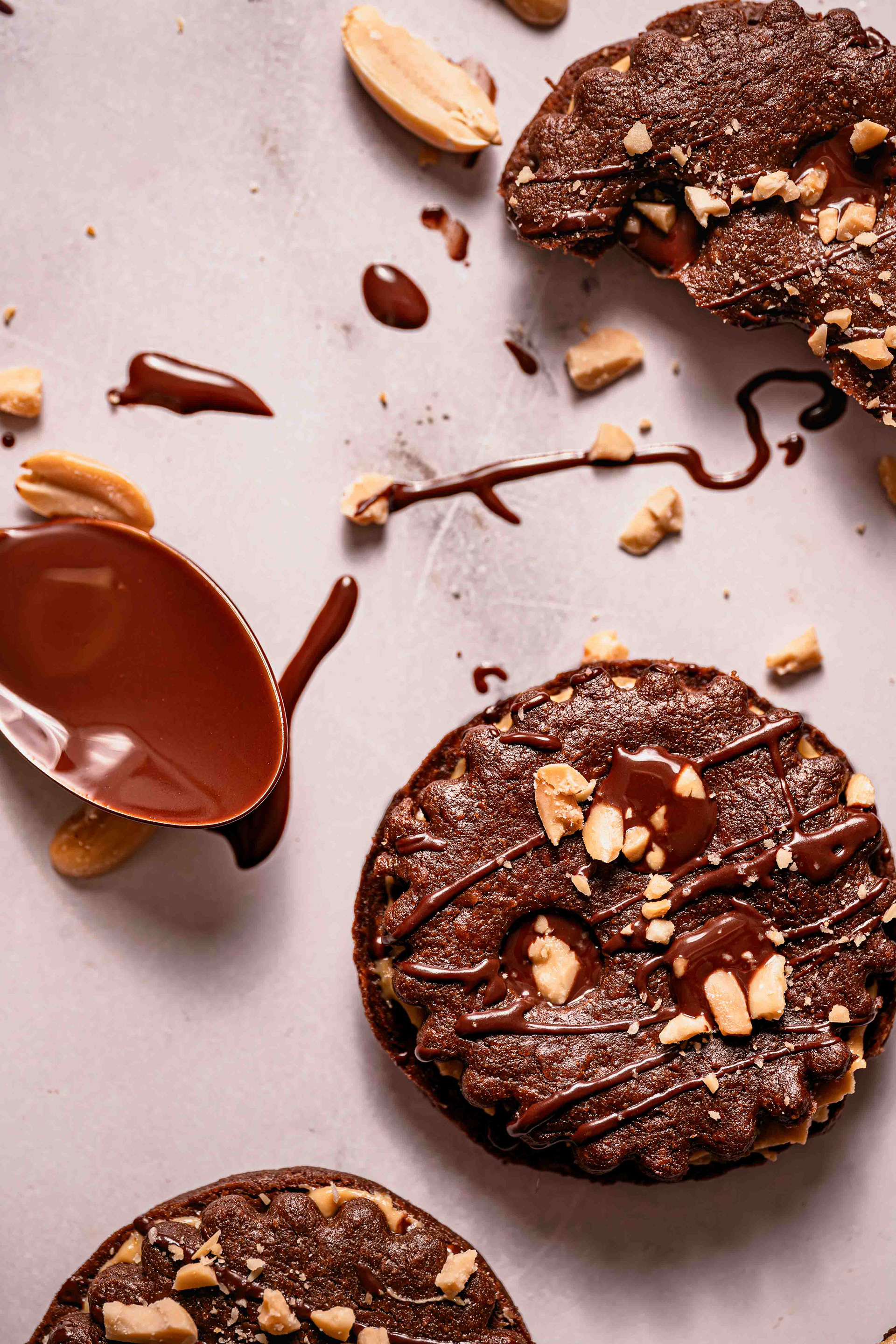 Peanut butter and chocolate Linzer Cookies with crumbed peanuts