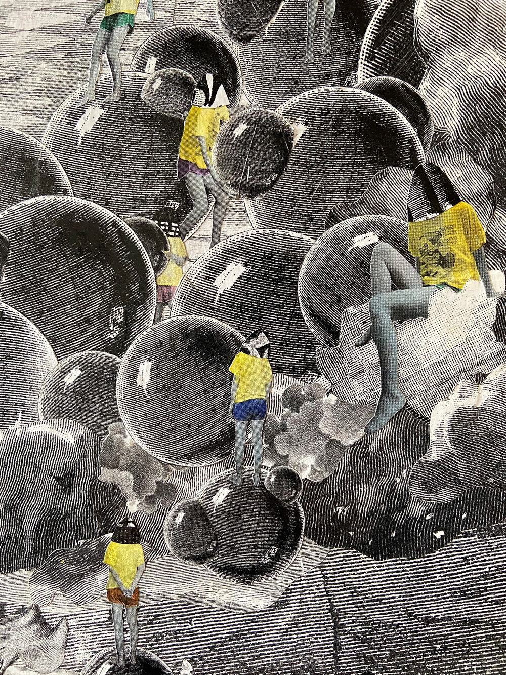 A close-up view of the initial stage of the evolving work collage.