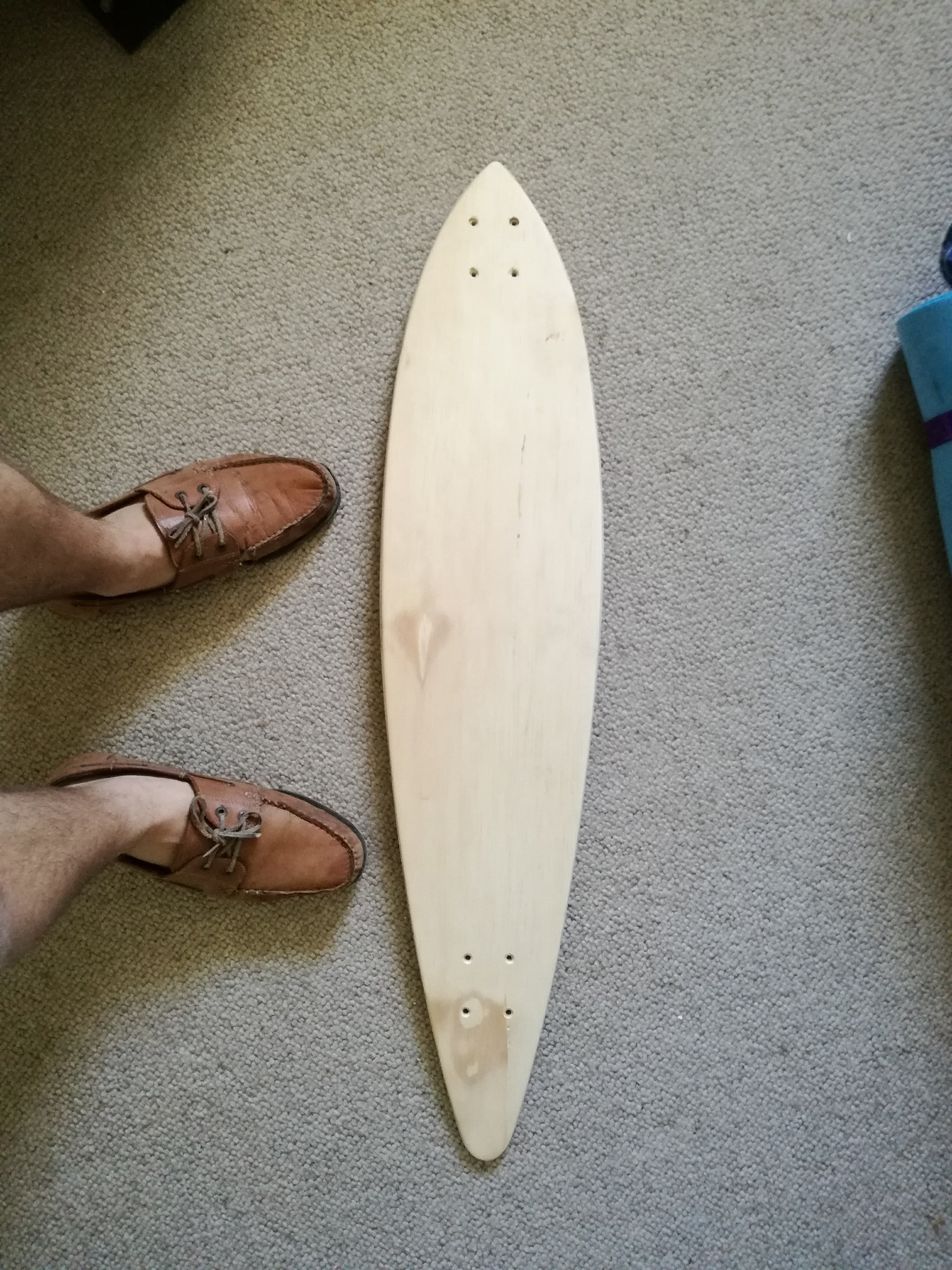 Final shape - sanded down, with truck holes drilled