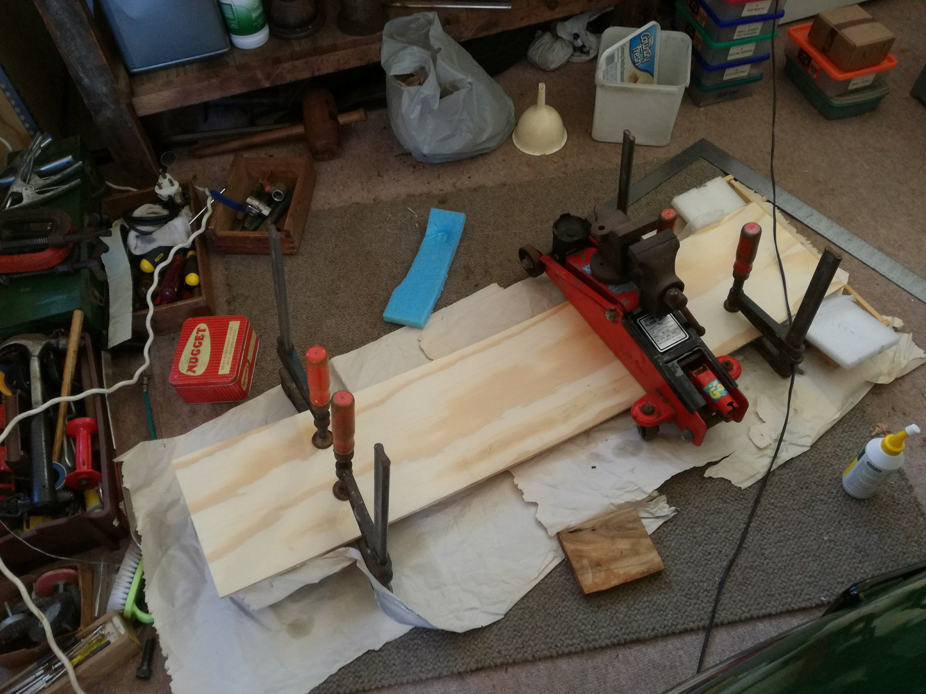 Glueing. Car jack added to make a curve.