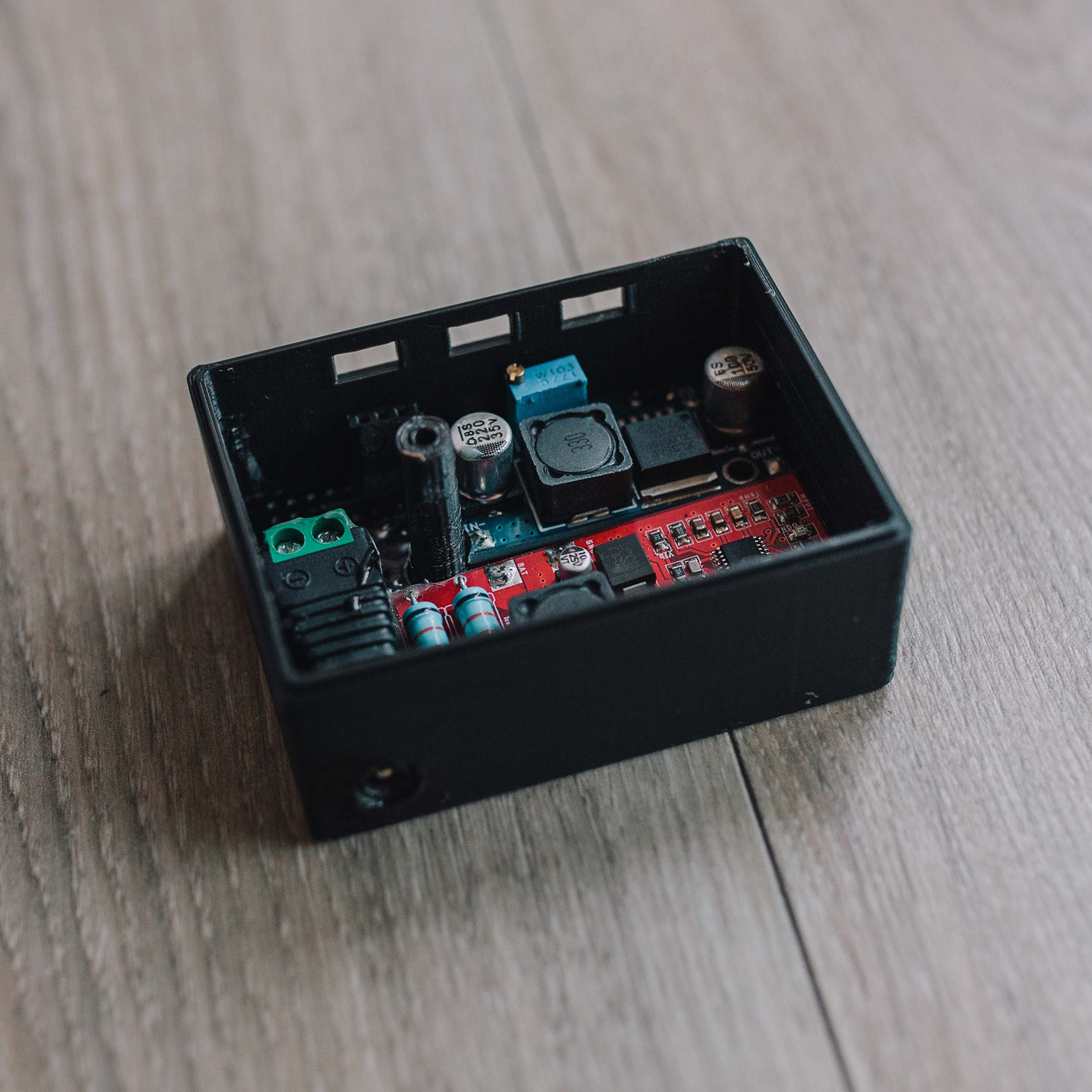 A closeup of the base circuit board in its case (the battery sockets were added afterwards)