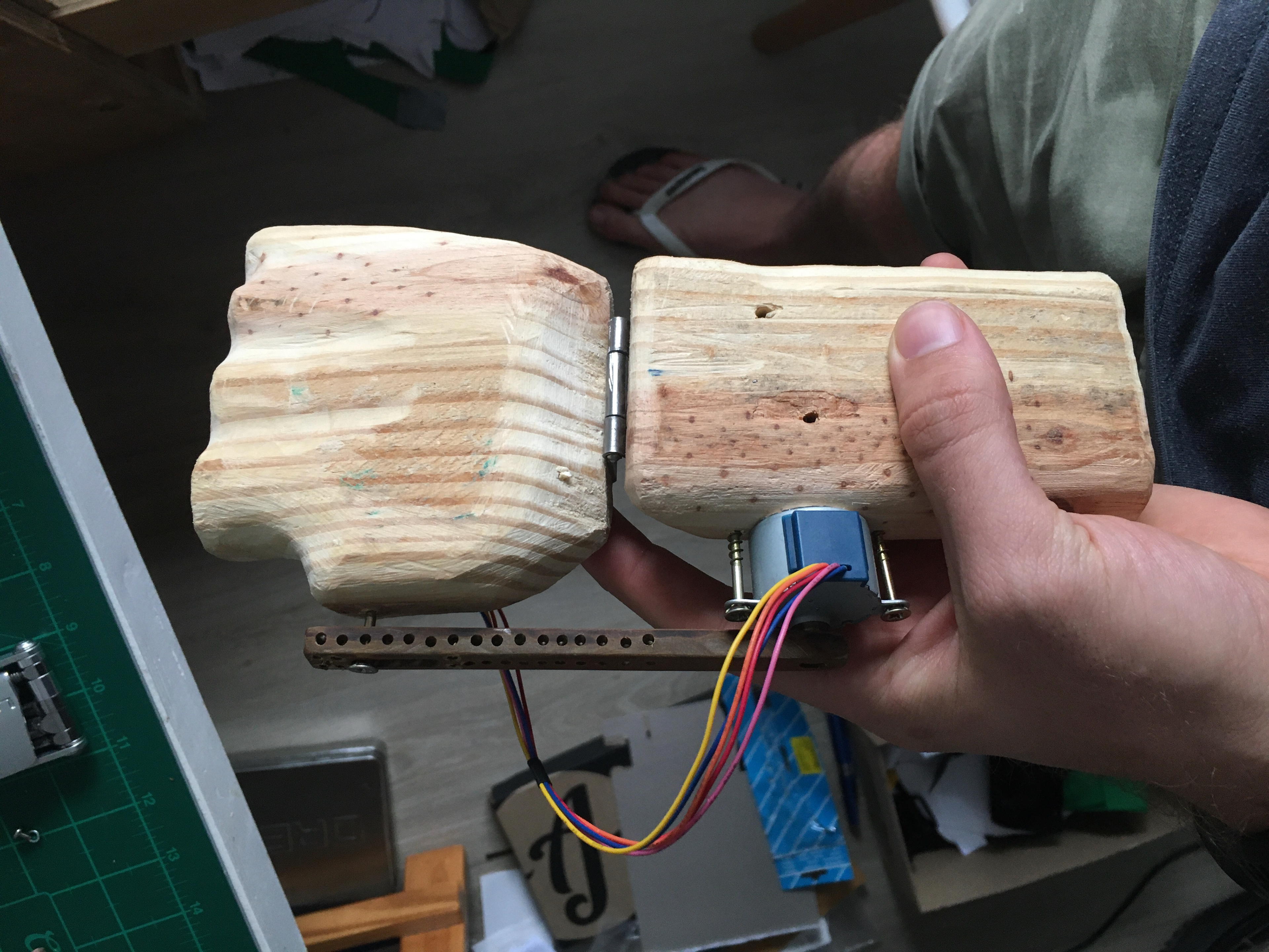 The first angle testing rig, fashioned from some pine with a door hinge in the middle. Proved far too heavy for the stepper motor to manipulate