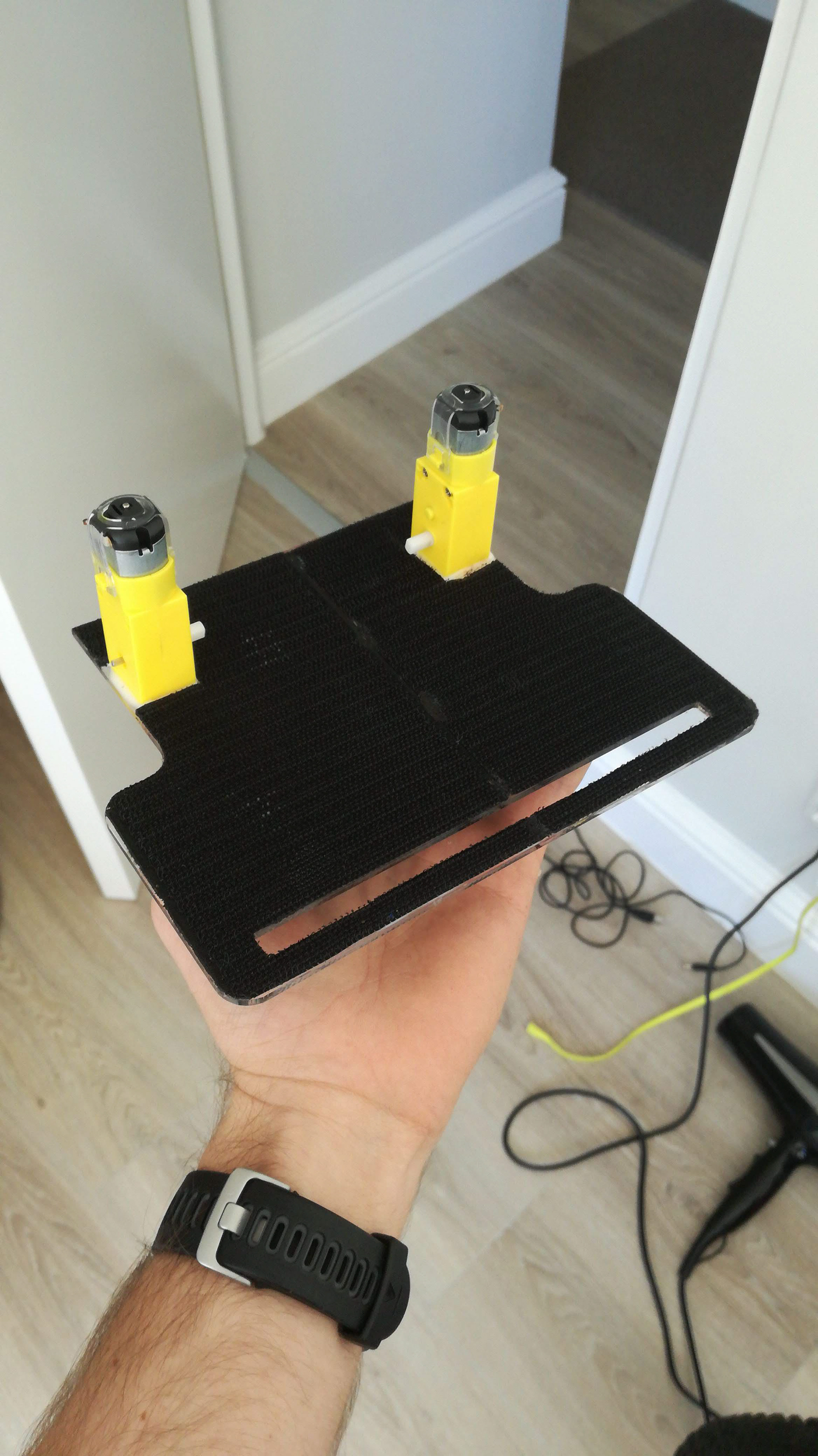 Velcro base and motors affixed to chassis