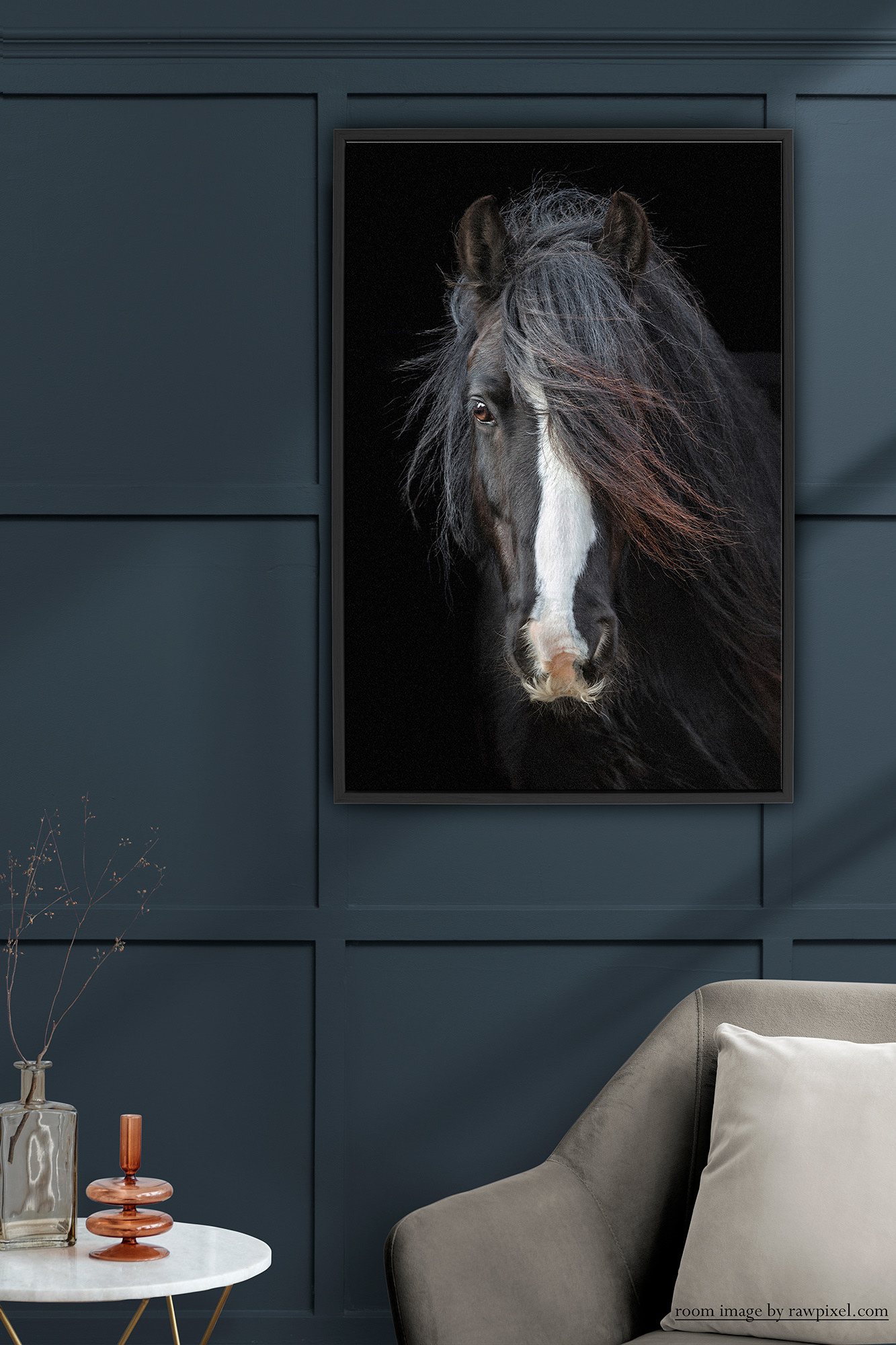A picture of a piece of wall art showing a black horse head looking straight at you in frame